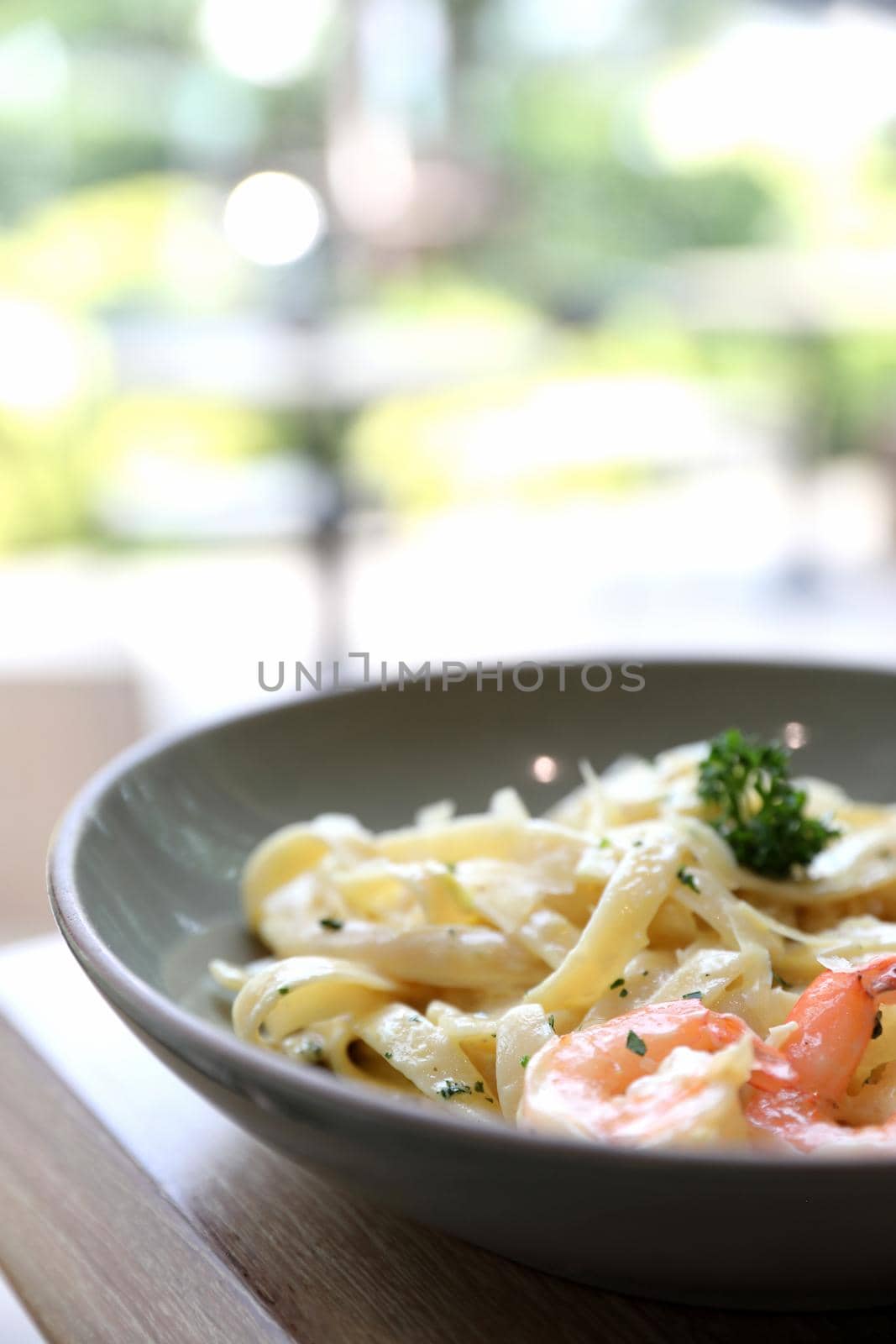 Spaghetti fettucini cream sauce with shrimp , Italian food by piyato
