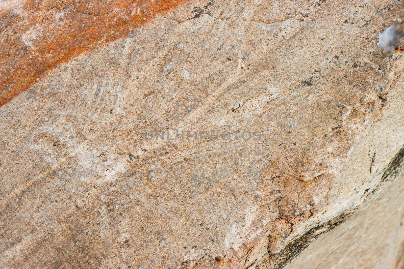 Abstract background of granite wall close-up.