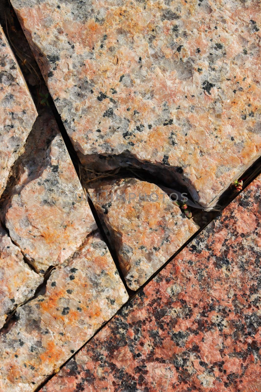 Damaged stone slabs with cracks close-up. by gelog67