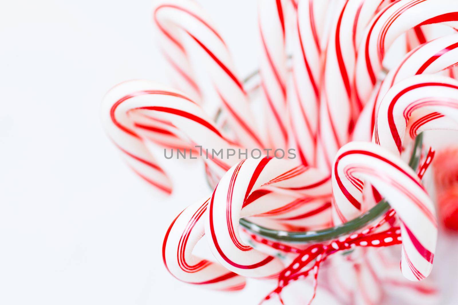 Peppermint candy canes on white background.