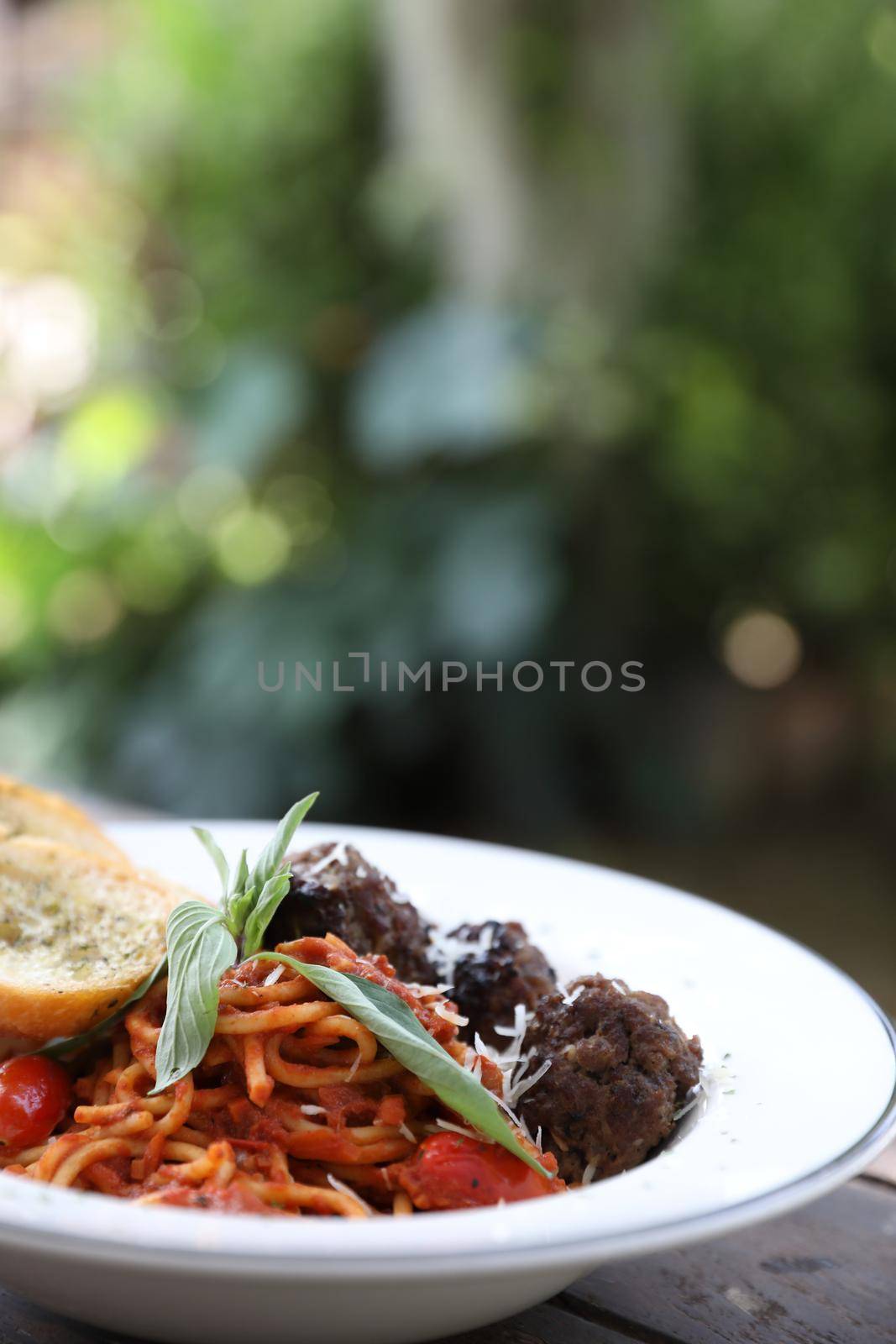 Spaghetti Meatballs on wood background