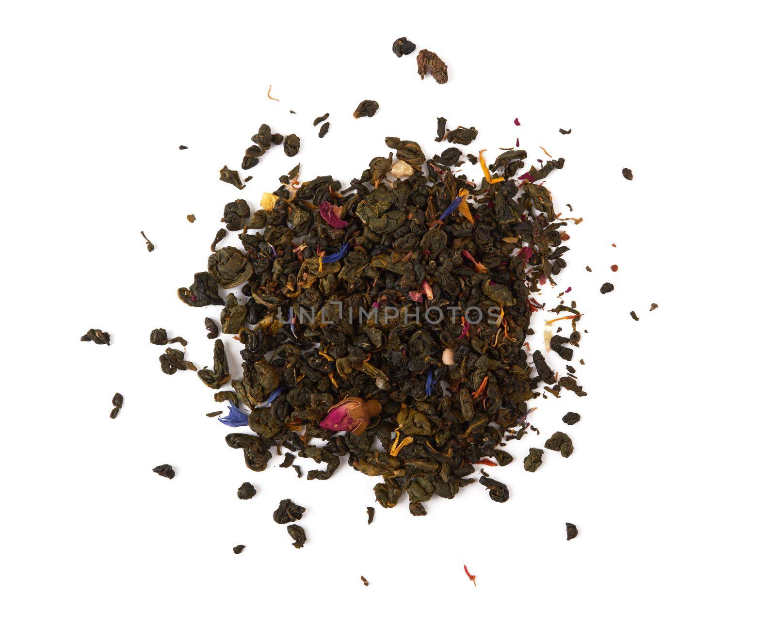 Falling dried tea leaves isolated on white background.