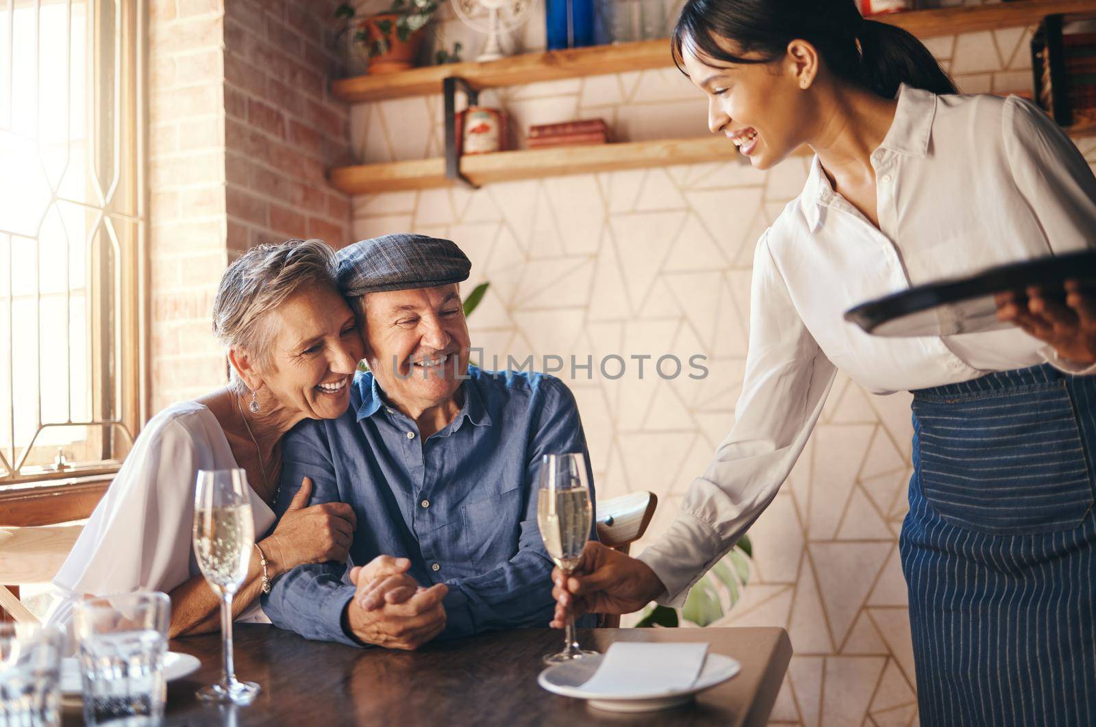 Love, couple elderly and celebrate marriage with date and wine at restaurant, happy, smile or relax together. Loving, senior man and woman with champagne for celebration of retirement or anniversary.