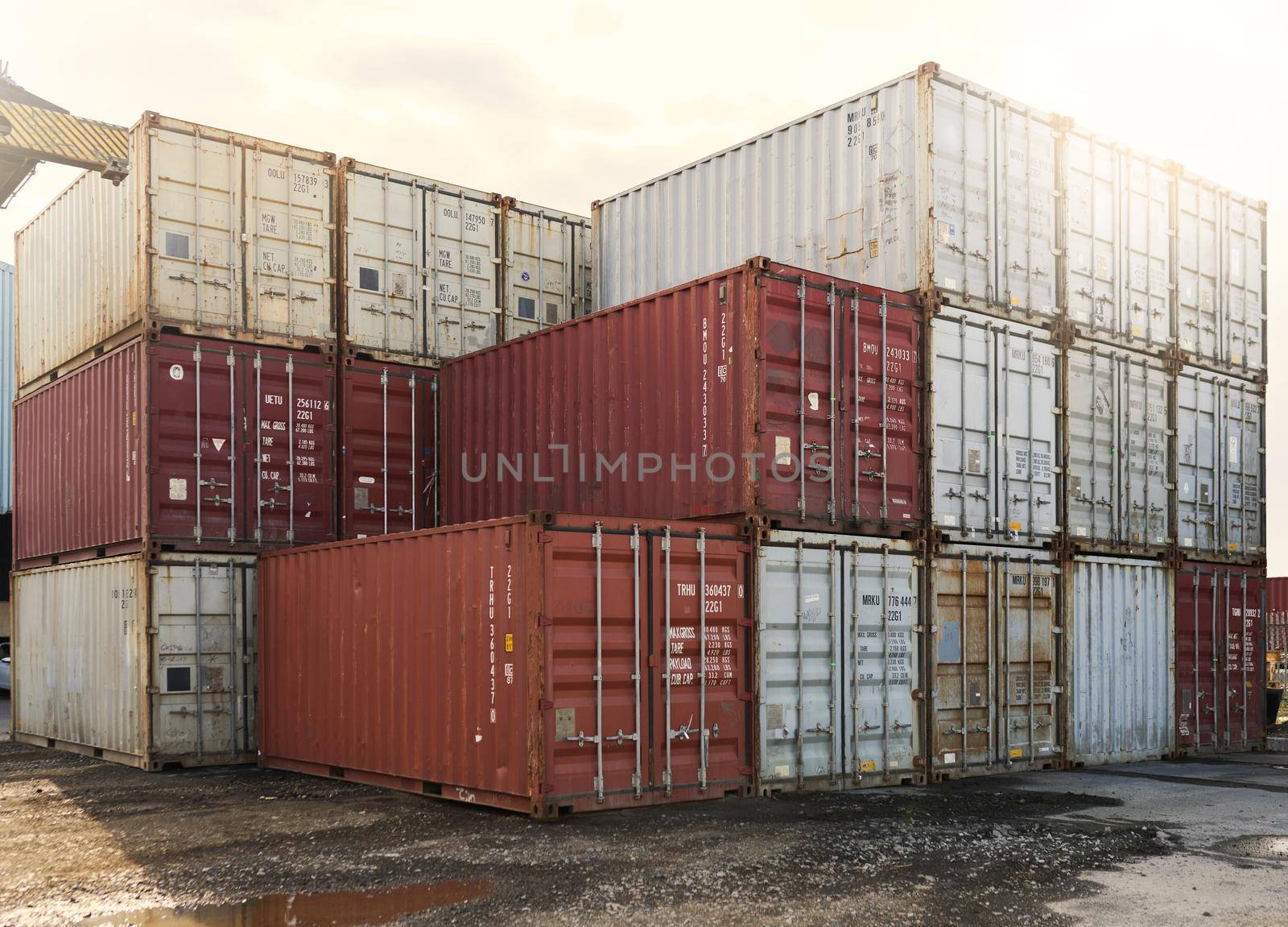 Container, shipping and logistics cargo storage on a port for international and global freight transport. Ecommerce stock, delivery service or trade of commercial distribution at outdoor supply chain by YuriArcurs