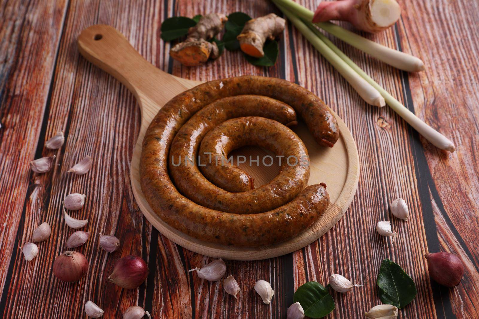 Local Northern Thai food , Northern Thai spicy sausage street food isolated in white background by piyato