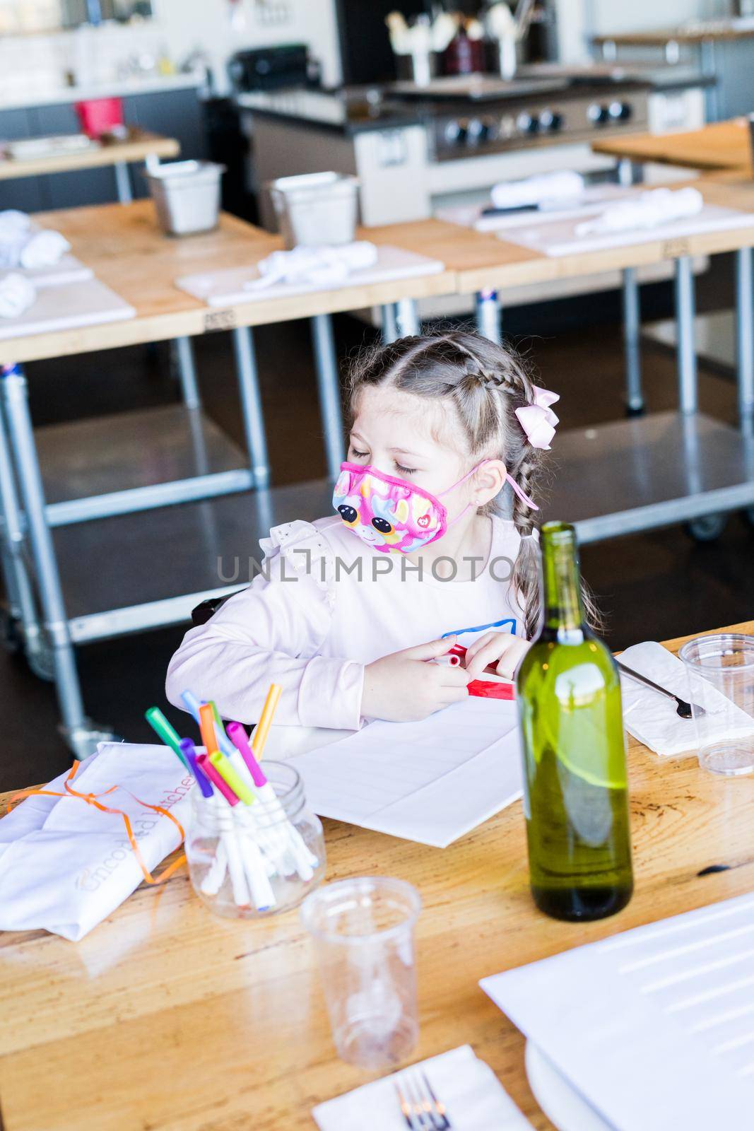 School age girl smiling for the camera.