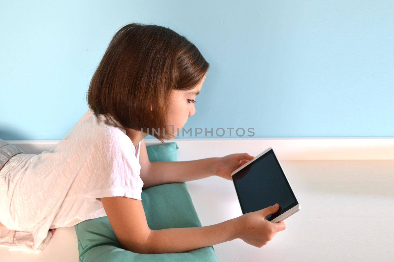 Girl student online learning class study online video call zoom teacher, Happy girl learn english language online with laptop at home. New normal. Social distancing. stay home . High quality photo