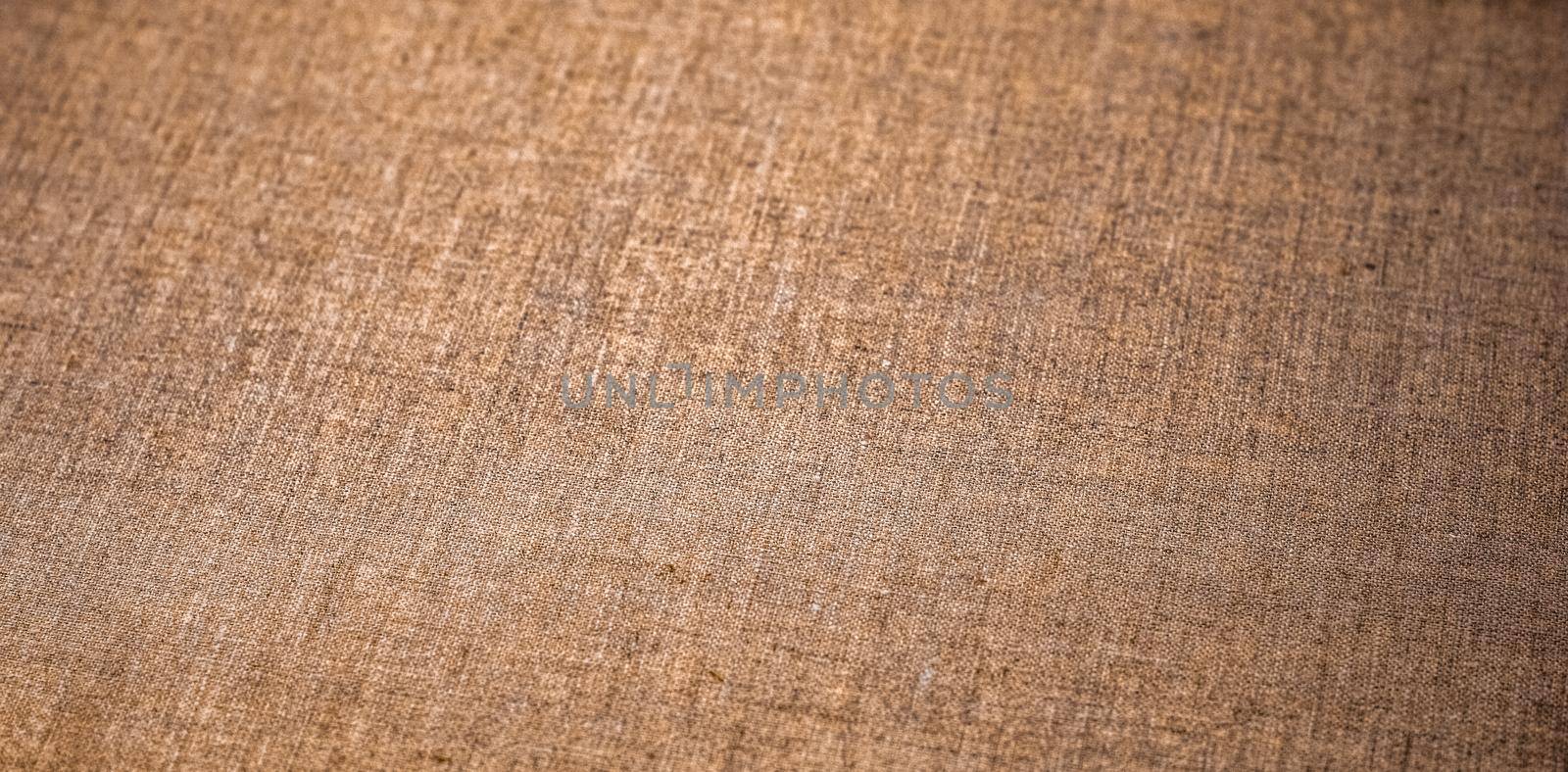 Decorative brown linen fabric textured background for interior, furniture design and art canvas backdrop by Anneleven