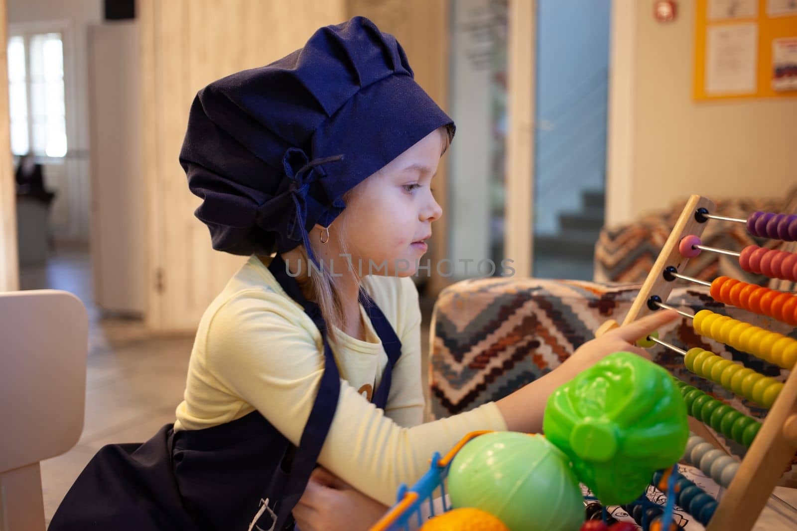 Girl learning to count. High quality photo