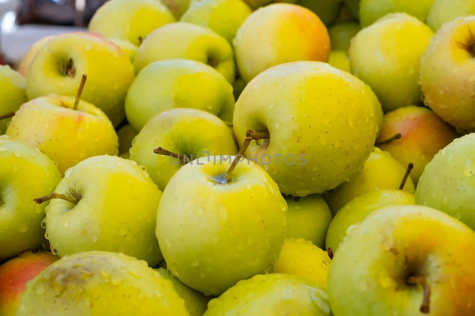 Variety of apples of different sorts in modern hypermarket. High quality photo