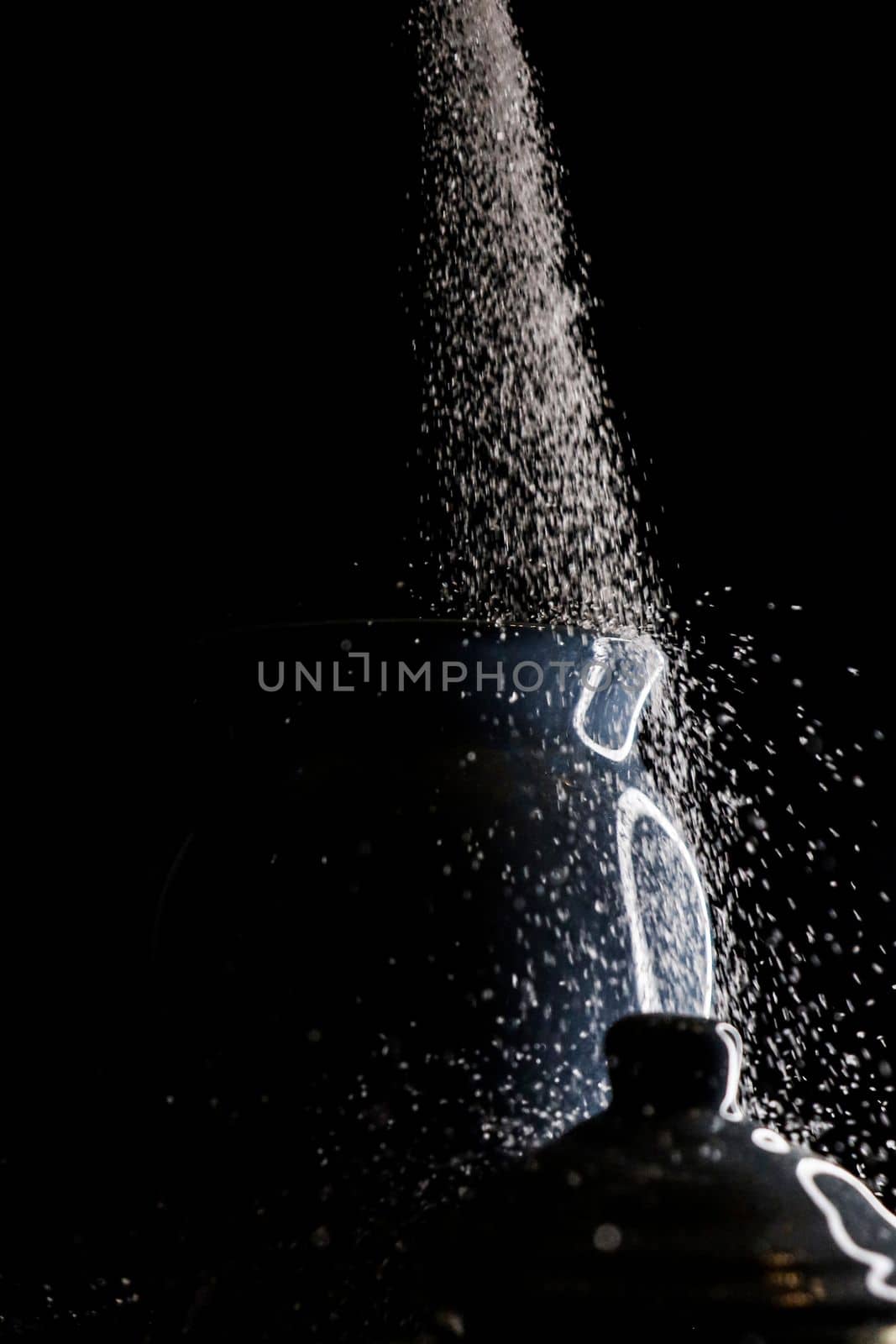 Sugar spill flow low light. High quality photo