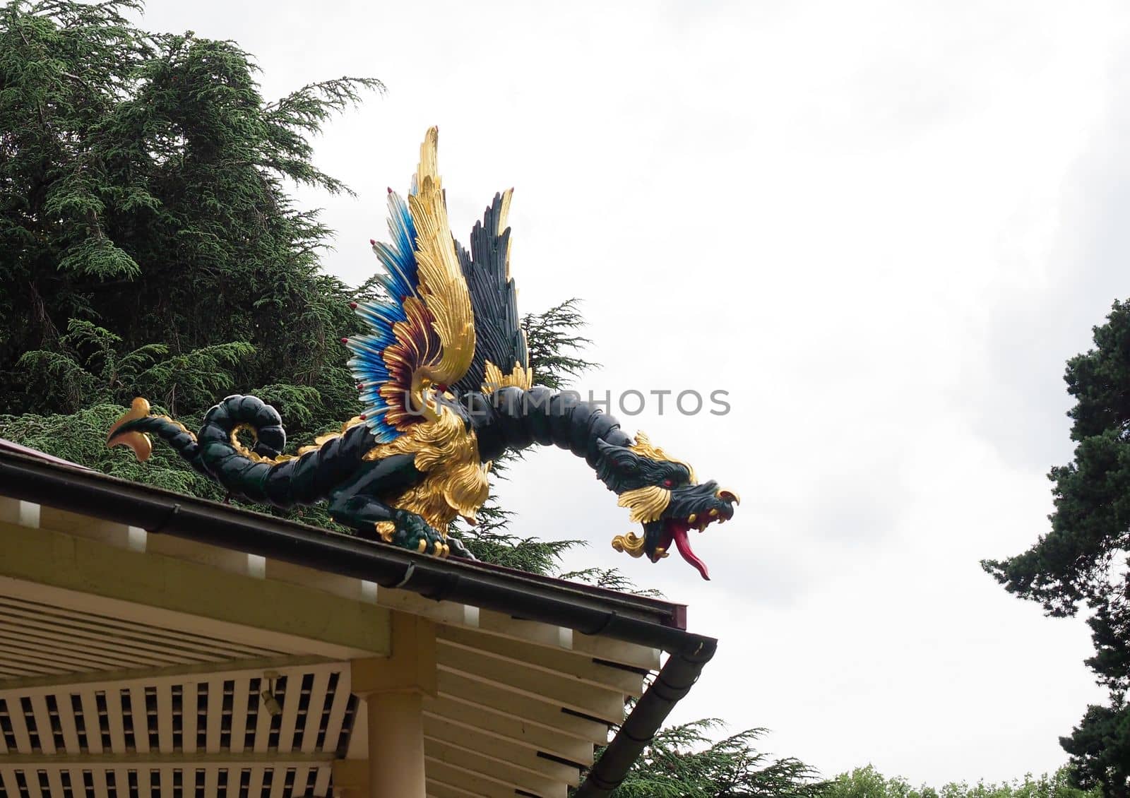 Detail of a restored mythical dragon figurine on the pagoda in Kew botanical Gardens in London