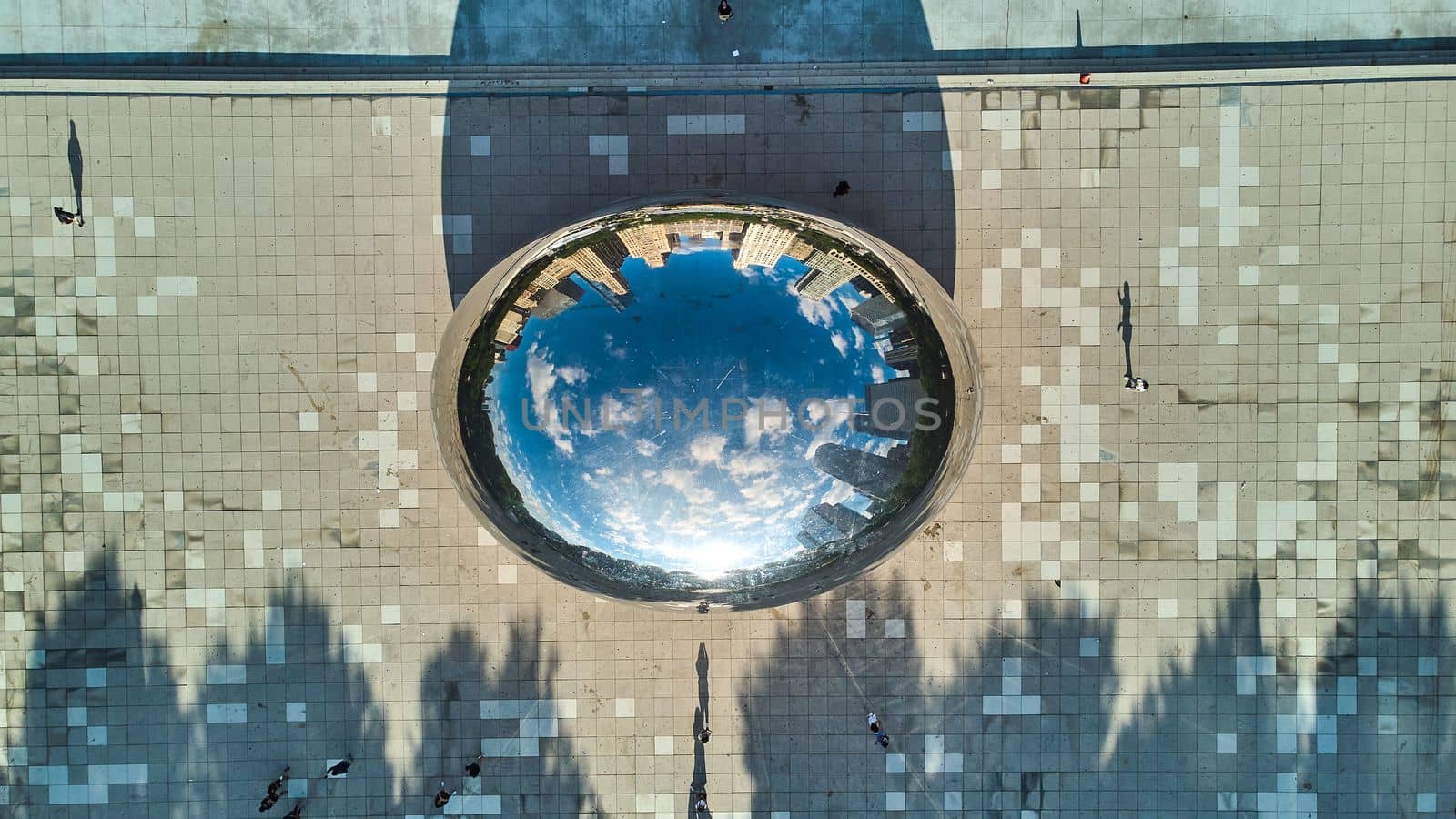 Close straight down view of Chicago Cloud Gate The Bean at Millennium Park reflecting city by njproductions