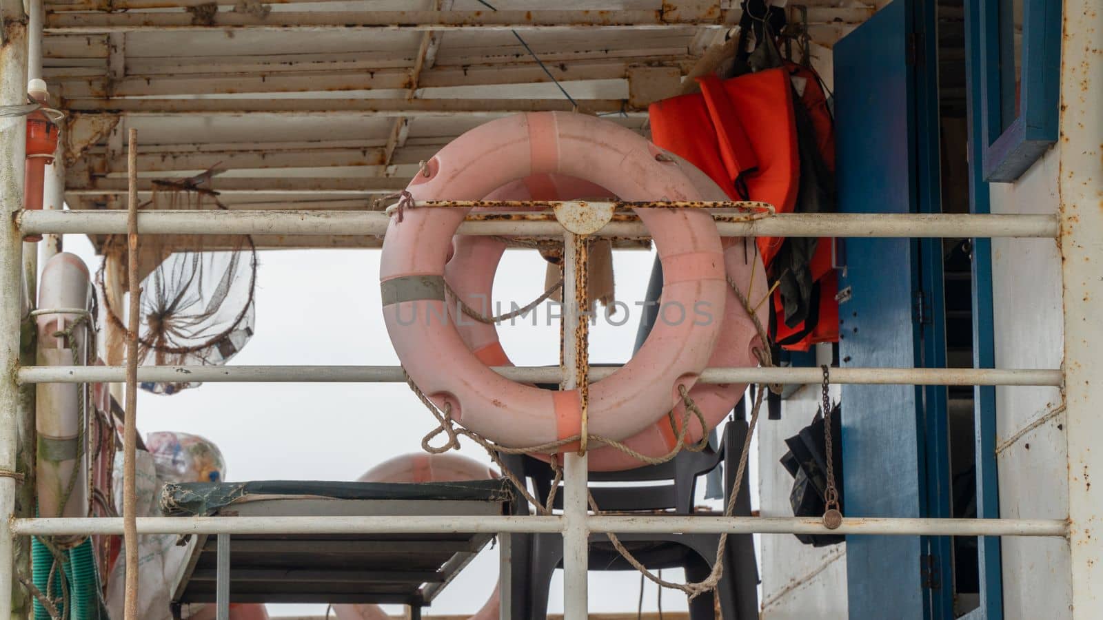 Faded old lifebuoy on a ship close-up. High quality photo