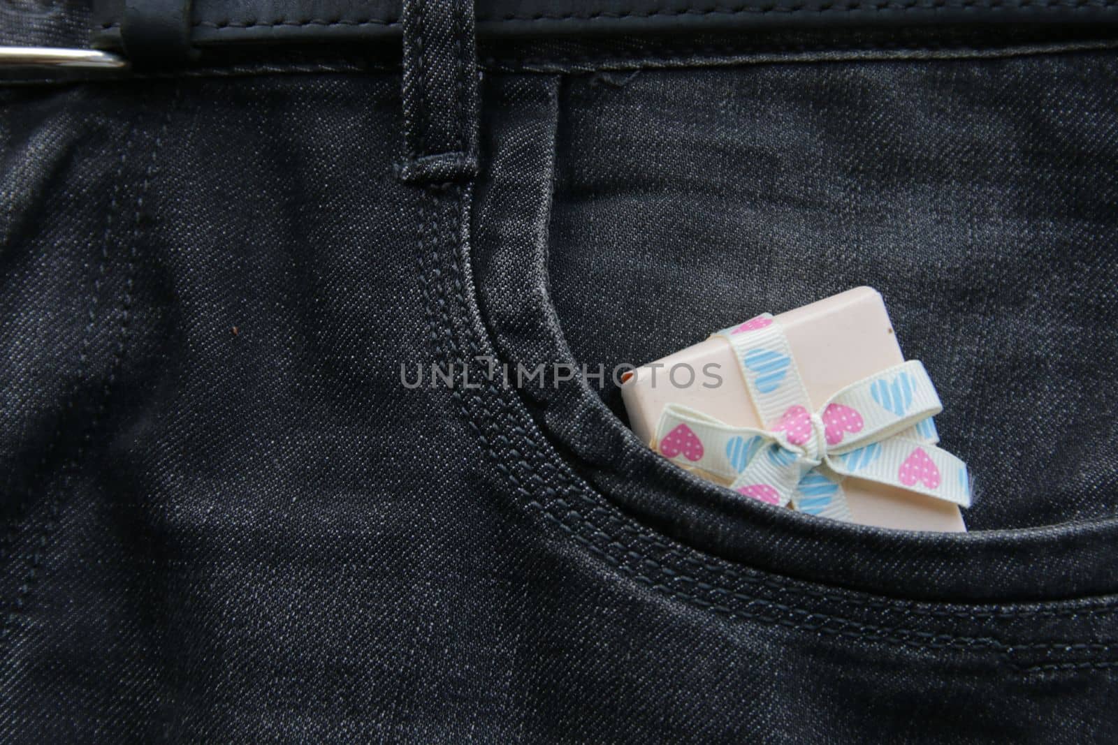 Gift in jeans pocket. Bonus concept. by Markgraf