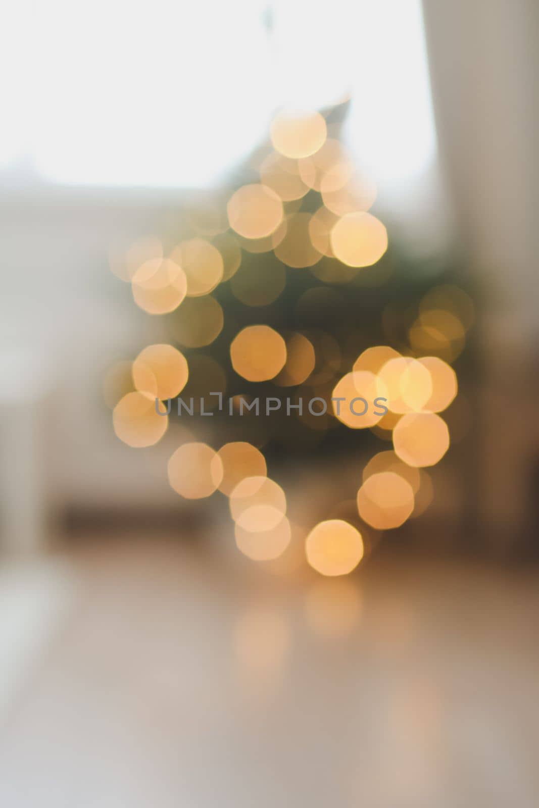 christmas background with christmas tree out of focus. abstract christmas background with defocused lights.
