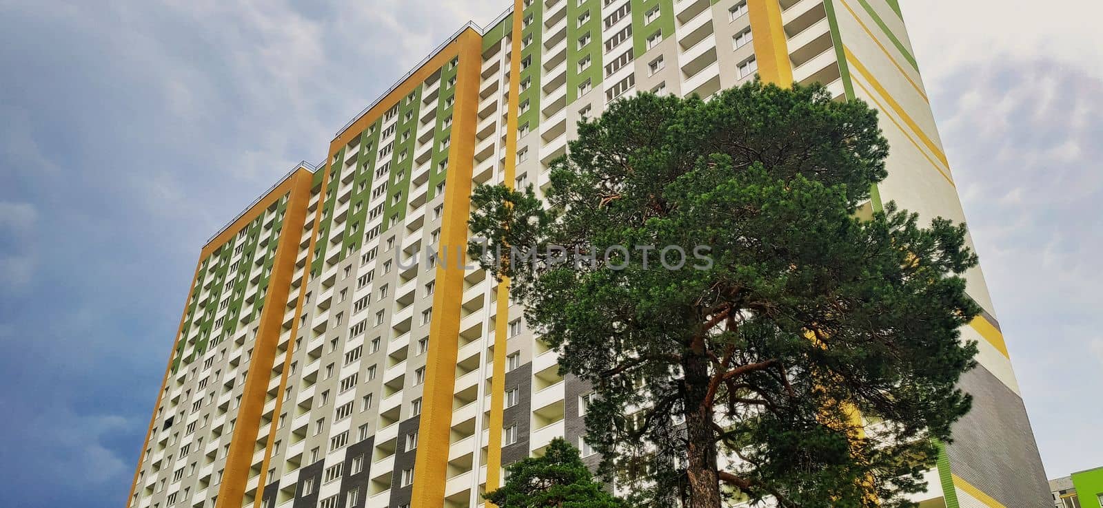 modern new apartment building on blue sky background