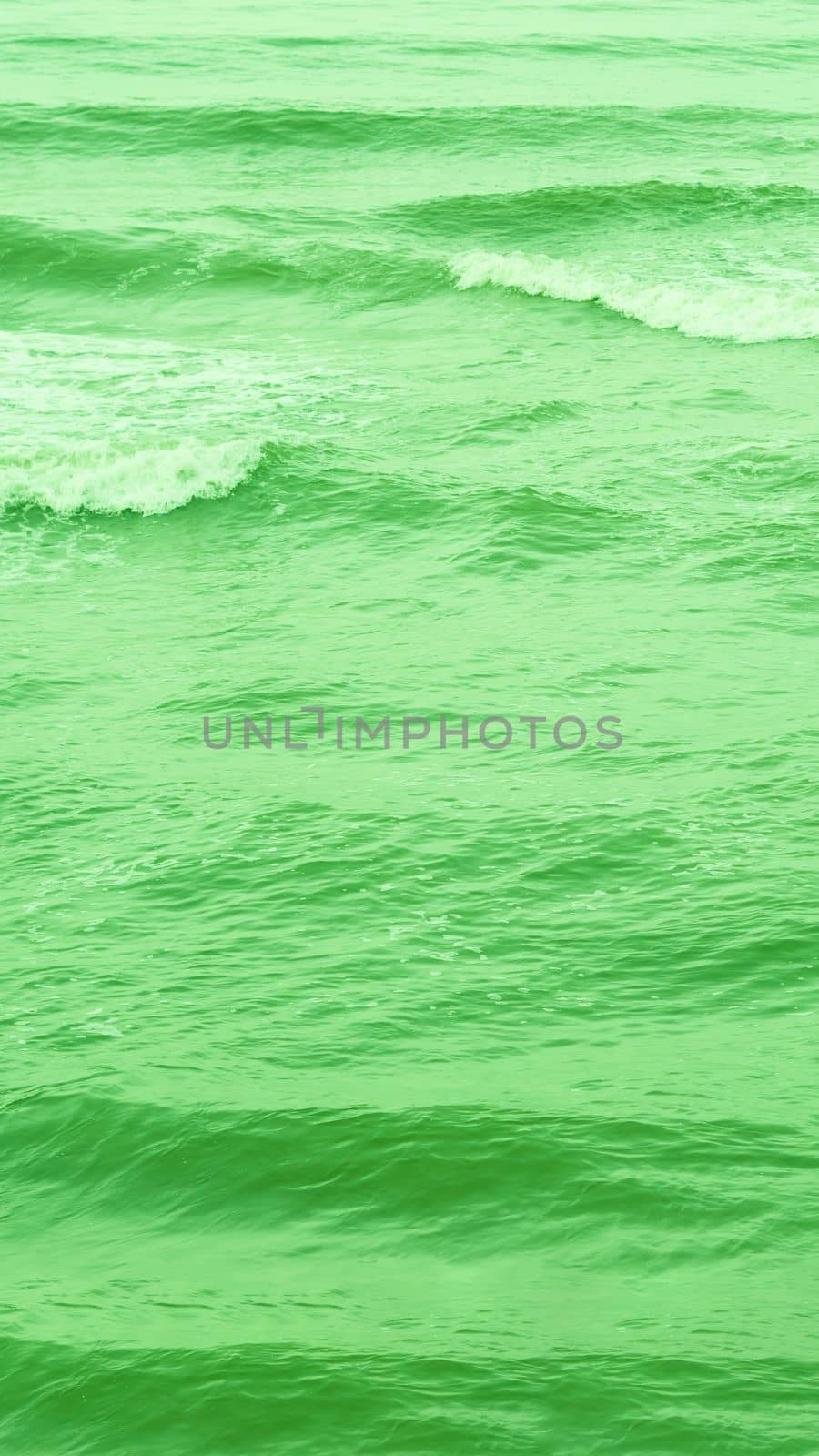 Real photo sea water waves, abstract background, nature power, bright green more tone in stock.