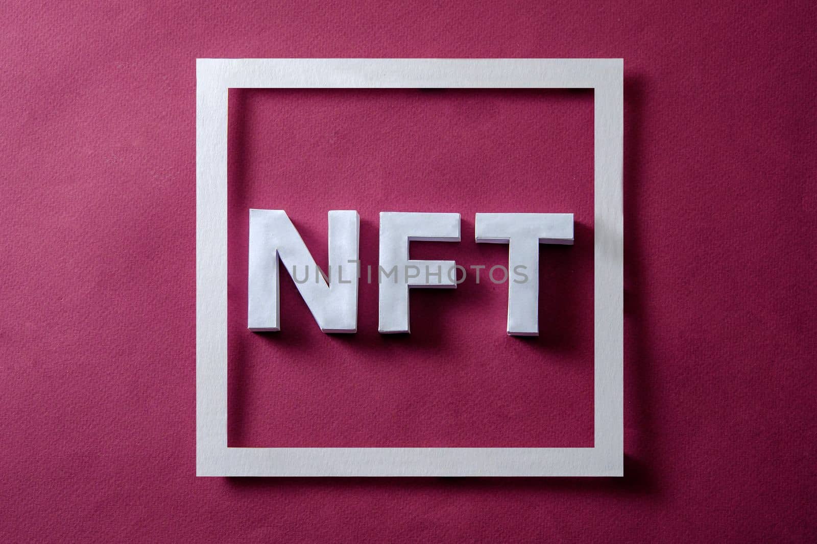 NFT in the token frame in the blockchain for online technologies for the sale and purchase of digital items in a decentralized metaverse and also the idea of crypto money. High quality photo