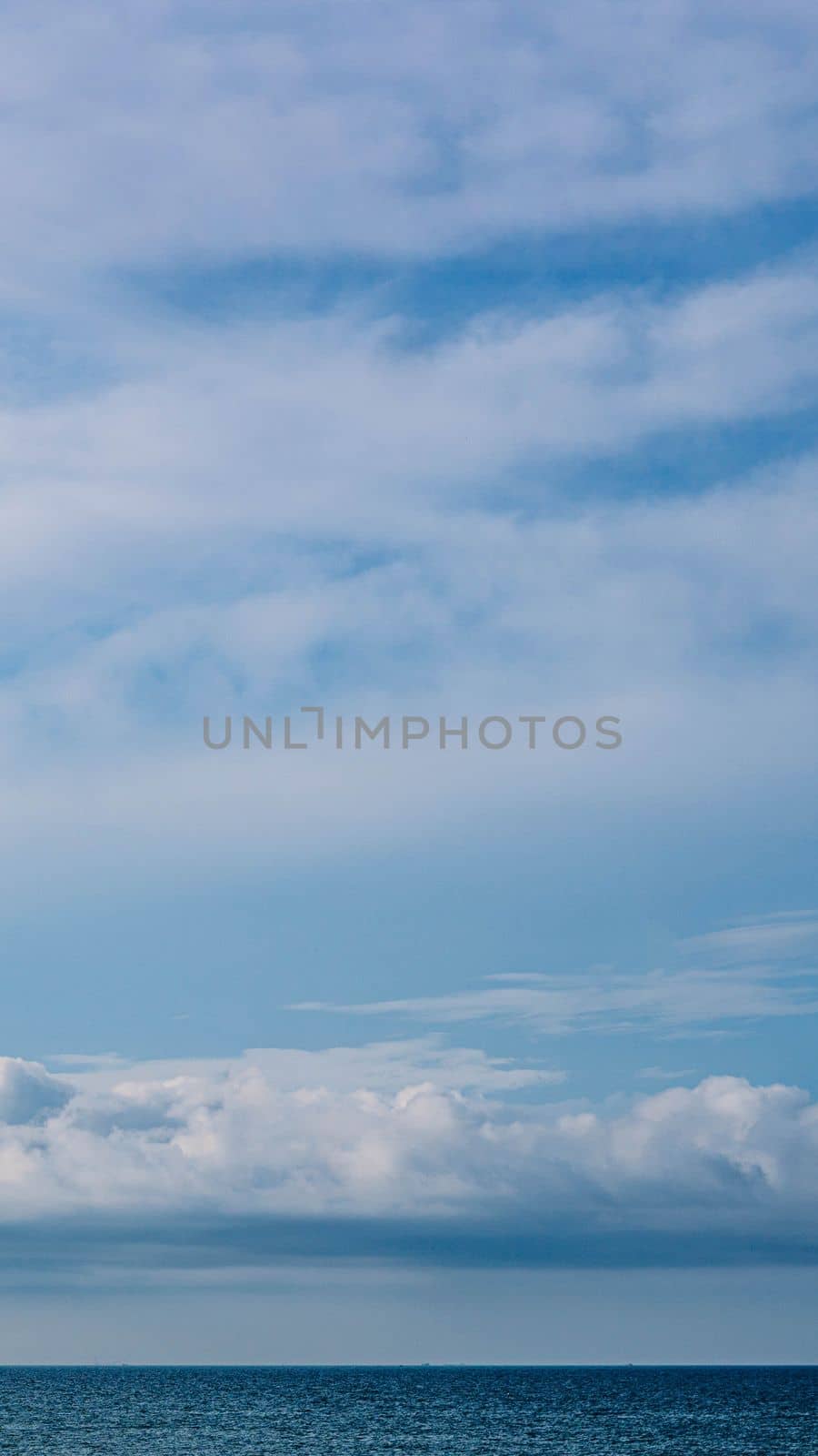 BANNER, VERTICAL STORY Atmosphere panorama white cloud clear blue sky horizon line calm empty sea. Concept paradise life. Design relax wallpaper background. More tone format in stock.