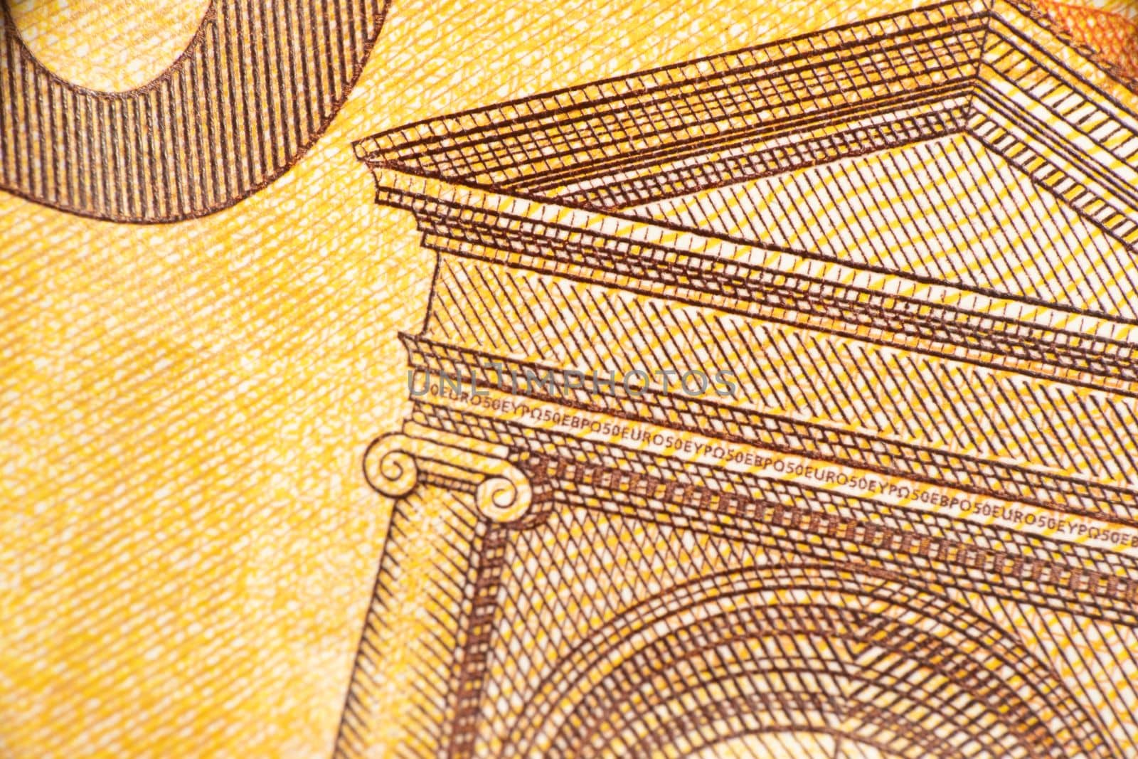 Close up macro fragment part of 50 euro money banknote. World money concept, inflation and economy concept. Finance and business. by DariaKulkova