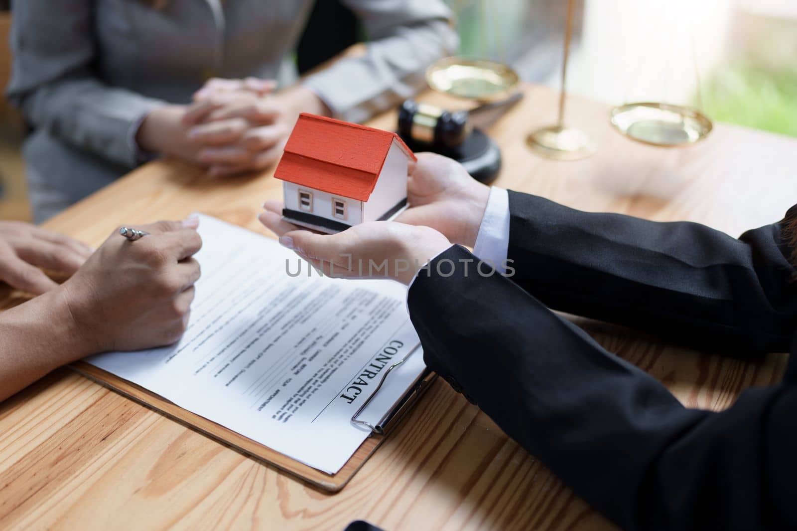 Guarantee, mortgage, agreement, contract, sign, real estate agent delivers the house to the customer after signing important contract documents by Manastrong