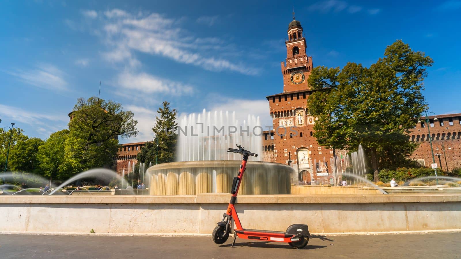 Electric scooter near Castello Sforzesco - Sforza Castle in Milan, Italy. Long Exposure.
