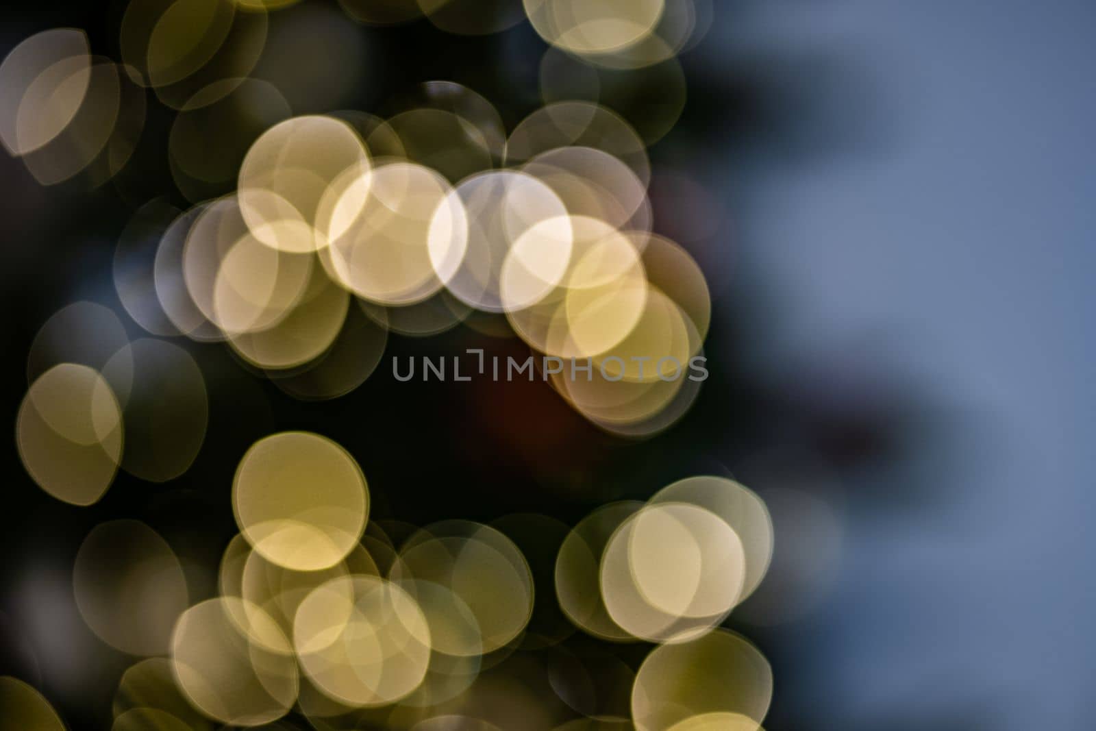 Blurred abstract lights with yellow and blue tones