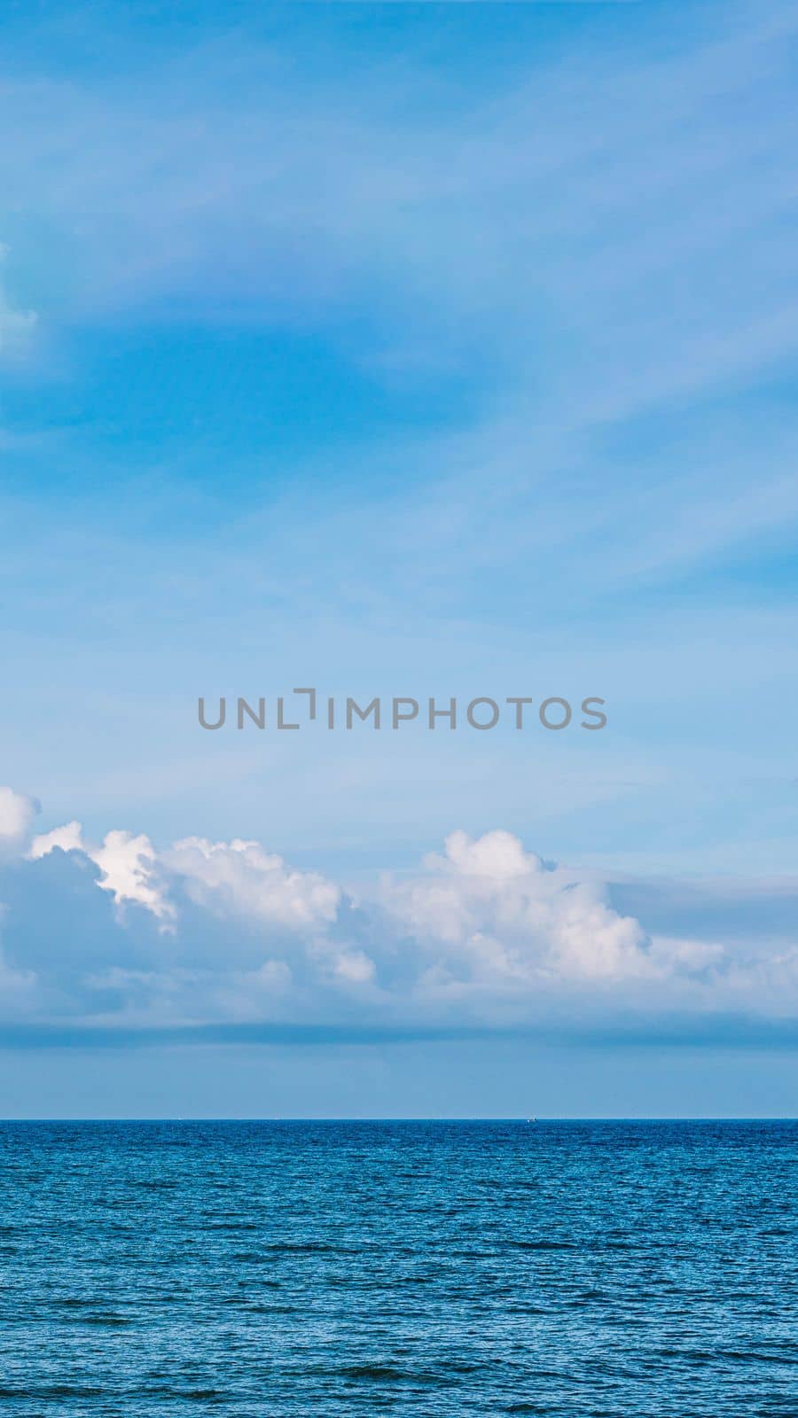BANNER, VERTICAL STORY Atmosphere panorama white cloud clear blue sky horizon line calm empty sea. Concept paradise life. Design relax wallpaper background. More tone format in stock.