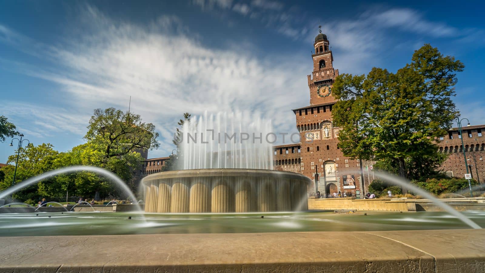 Castello Sforzesco square with fountain in Milan, Italy. Long Exposure.