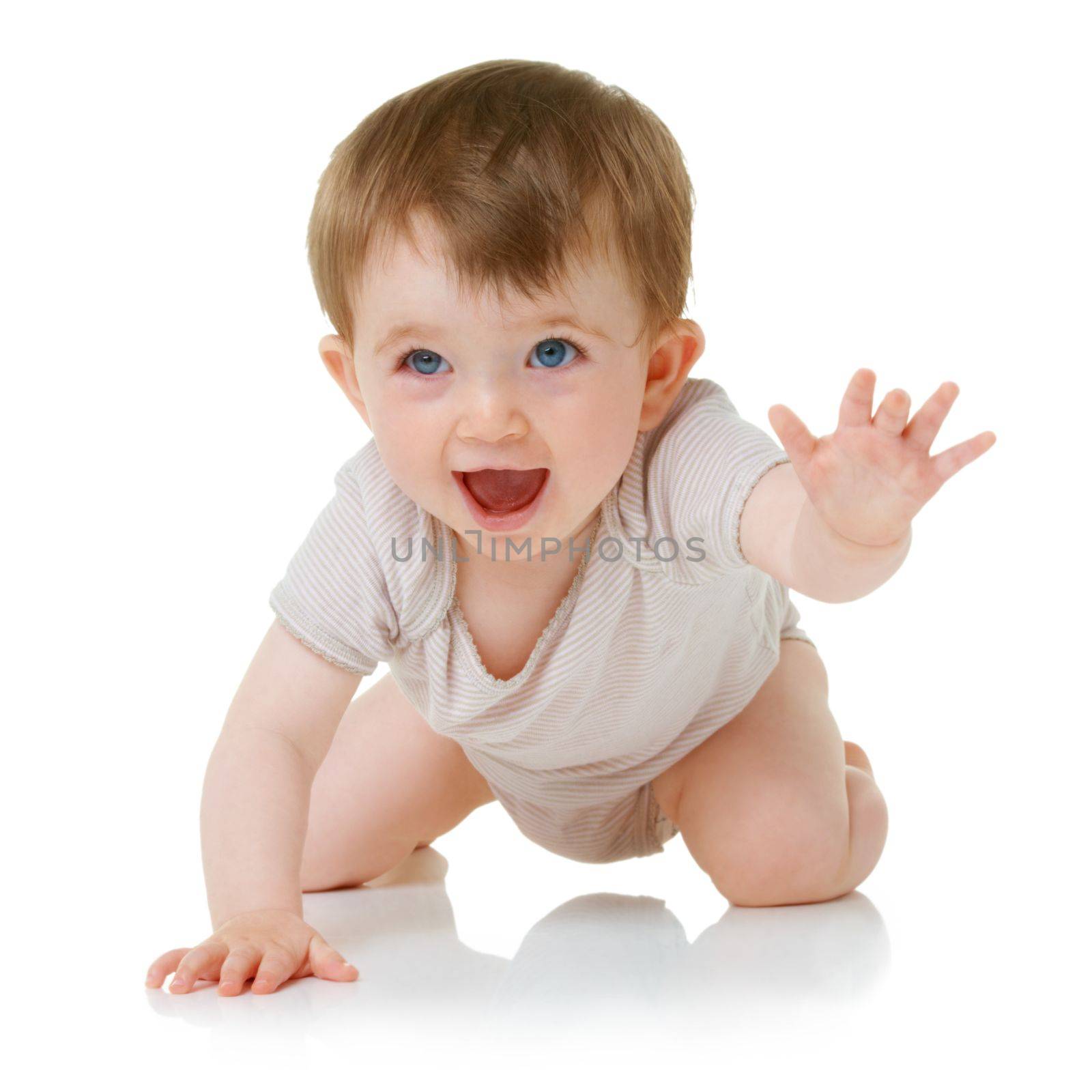 Shes nearly there. An adorable little baby crawling towards you isolated on white