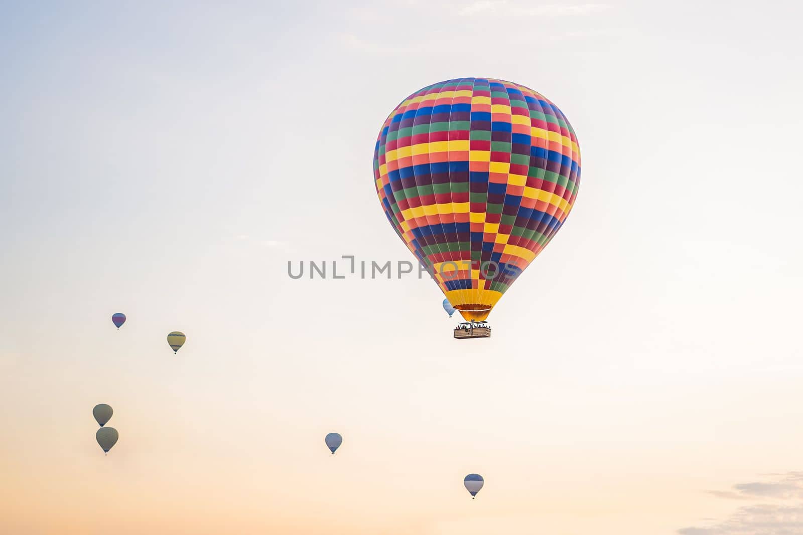 Beautiful hot air balloons over blue sky.