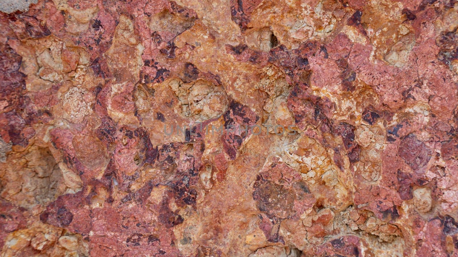 The texture of the stone is red orange, brick, background material by voktybre