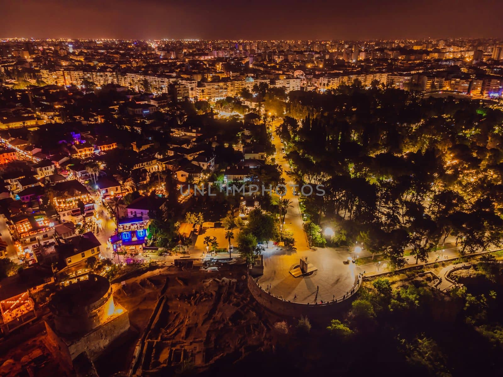 Night top aerial view of the old town Kaleici and old harbor in Antalya, Turkey. Turkey is a popular tourist destination.