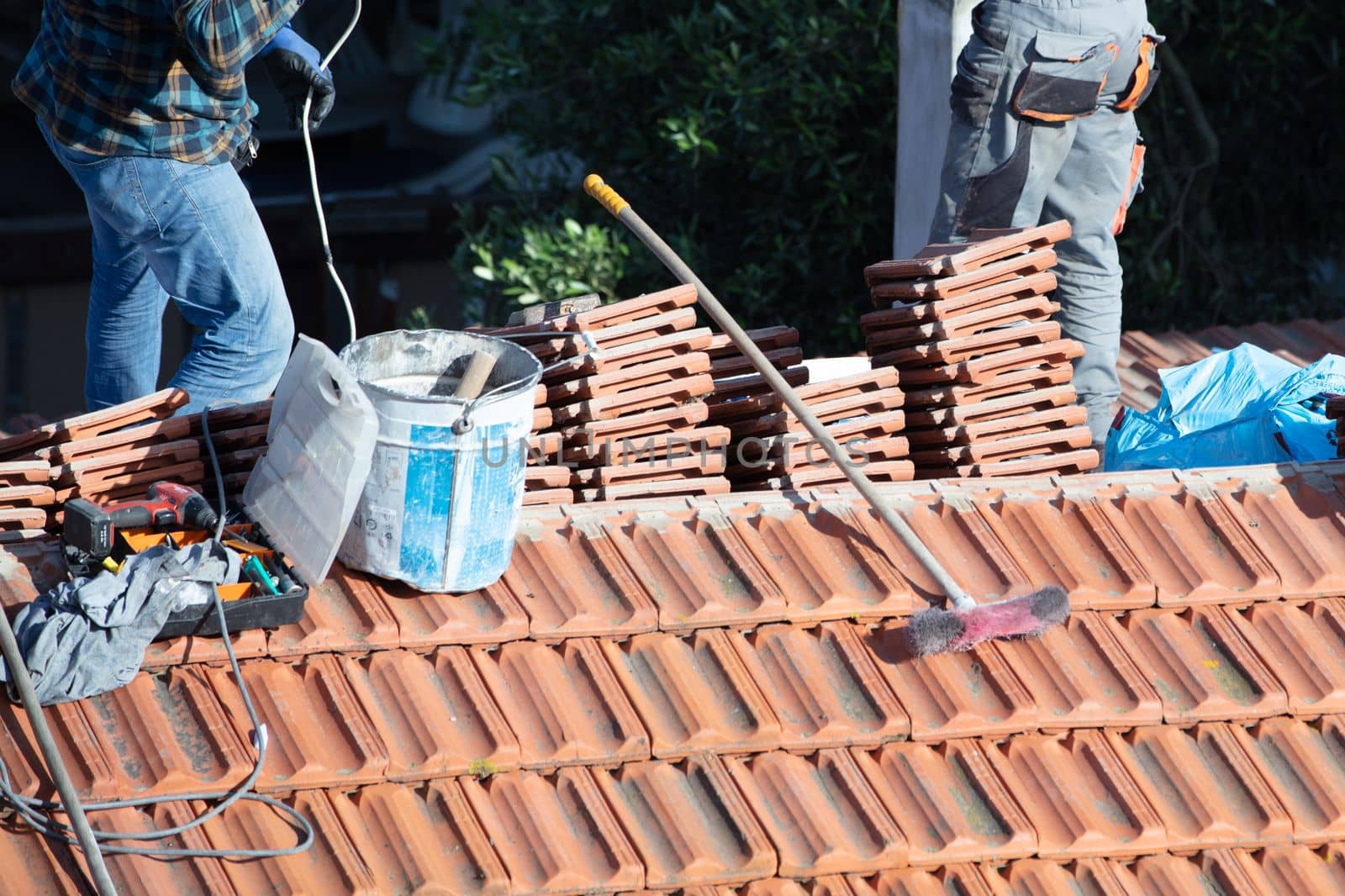 repairing the roof of a home