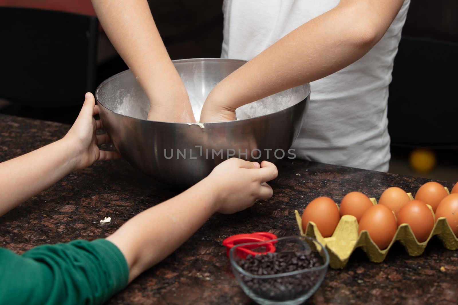 Close-up child`s hands preparing cookies by senkaya