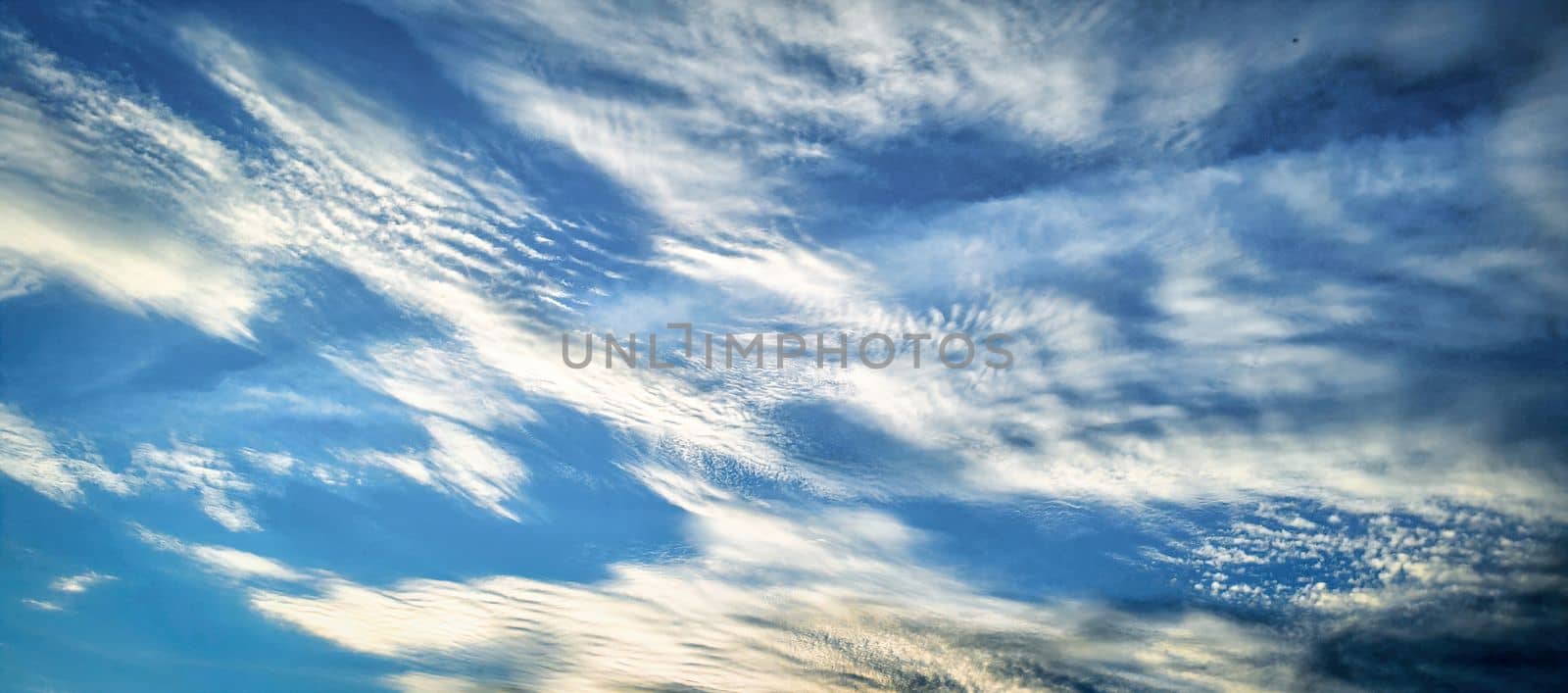 Blue sky with clouds background. download image by igor010