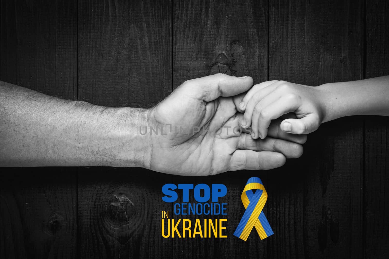 male hands hold childrens on a dark background with words stop genocide in ukraine black and white color. concept needs help and support, truth will win