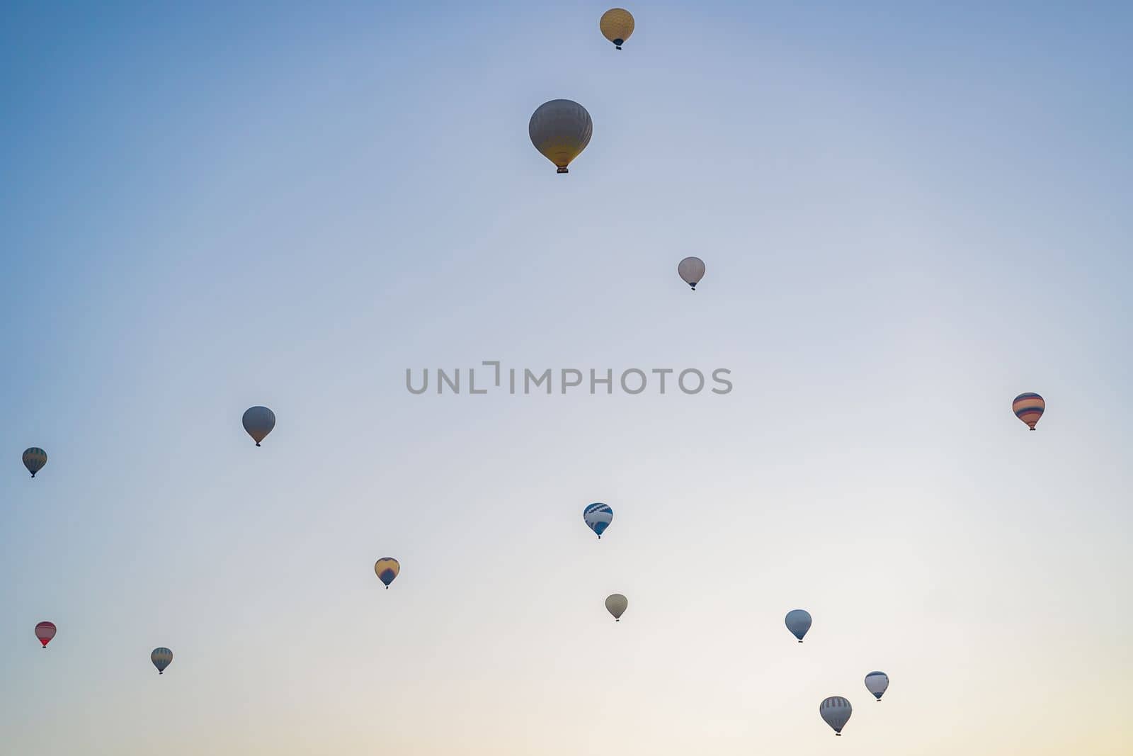 Beautiful hot air balloons over blue sky.