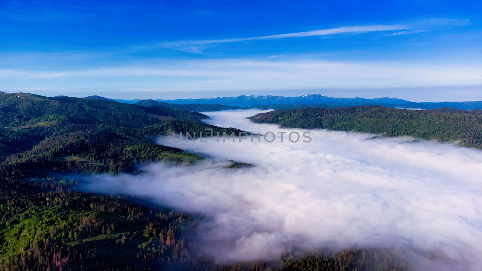 fog and cloud mountain valley landscape. foggy mountains