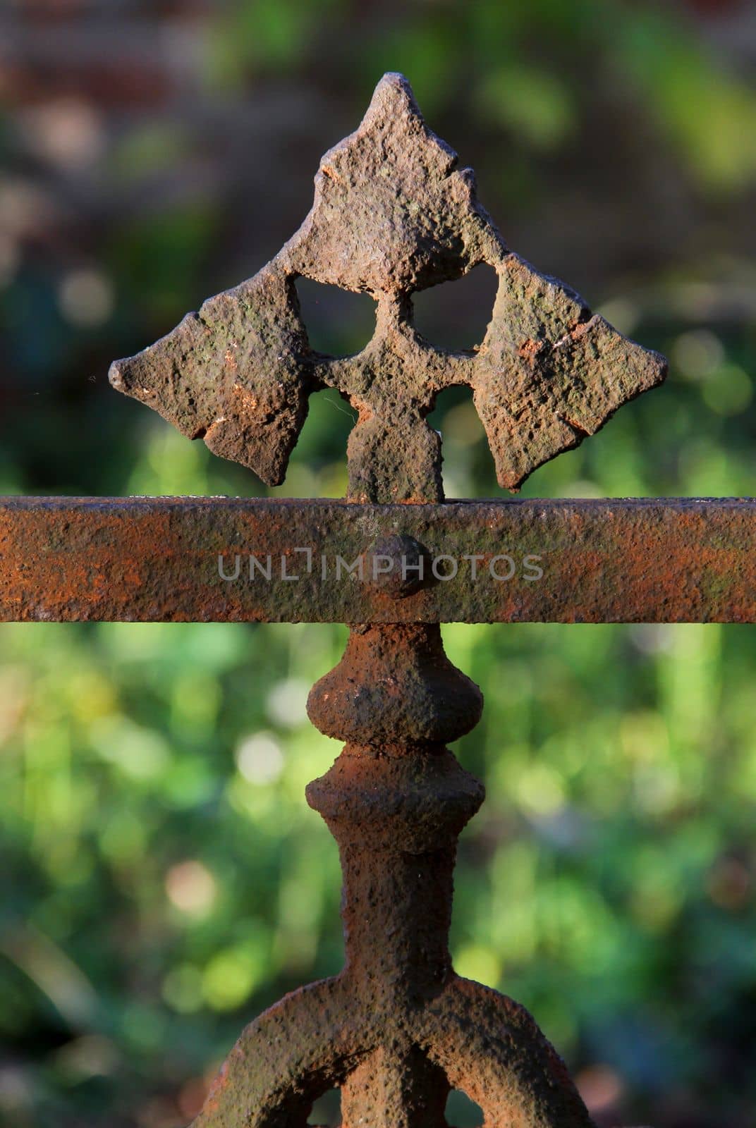 Old brown rusty weathered fence ornament close up. High quality photo