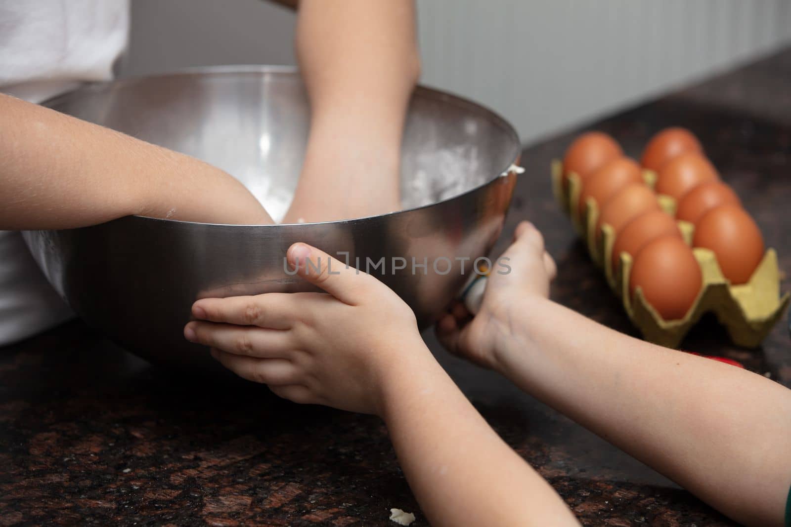 Close-up child`s hands preparing cookies by senkaya