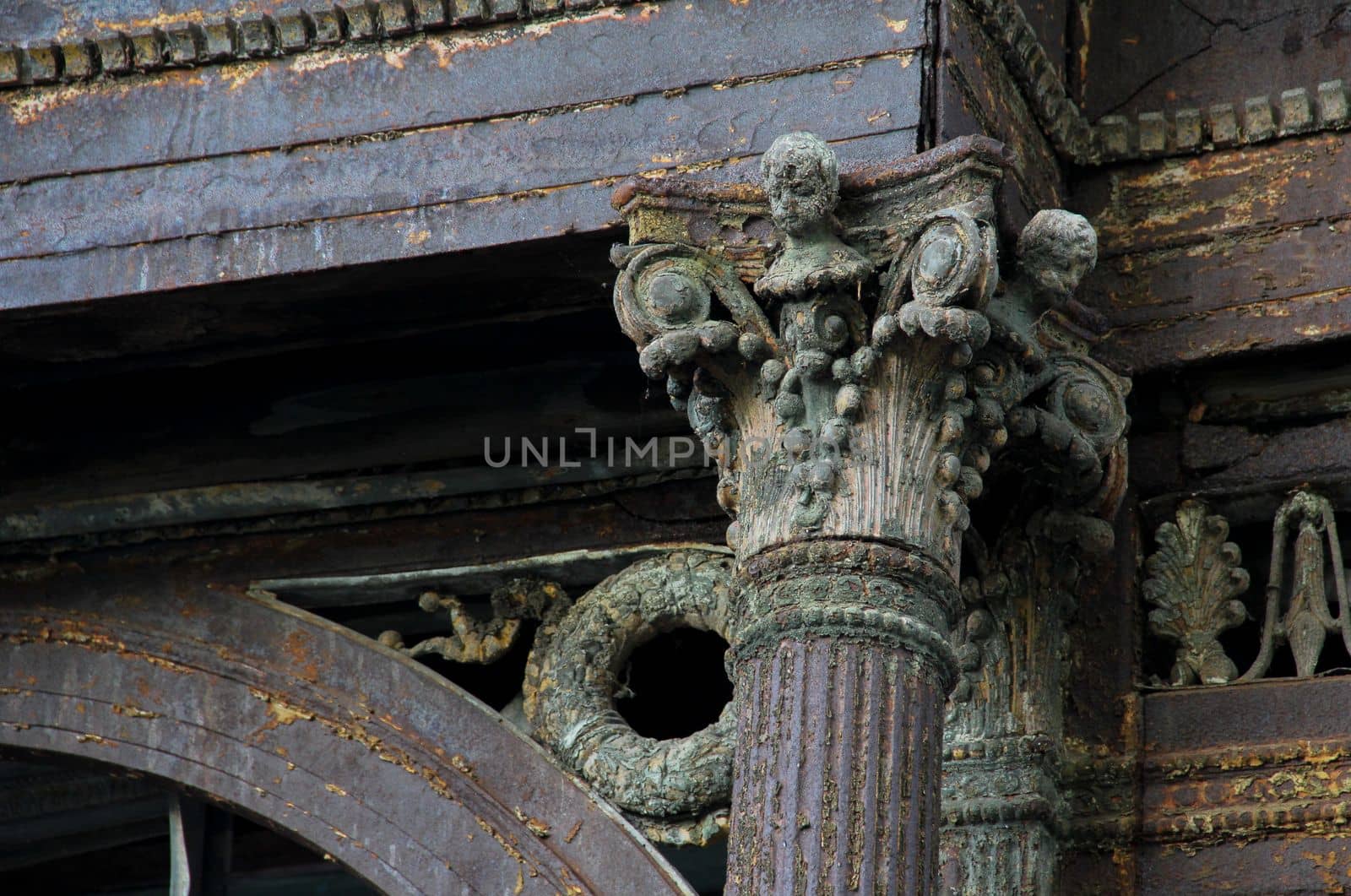 weathered carved support column of a ruined building. High quality photo