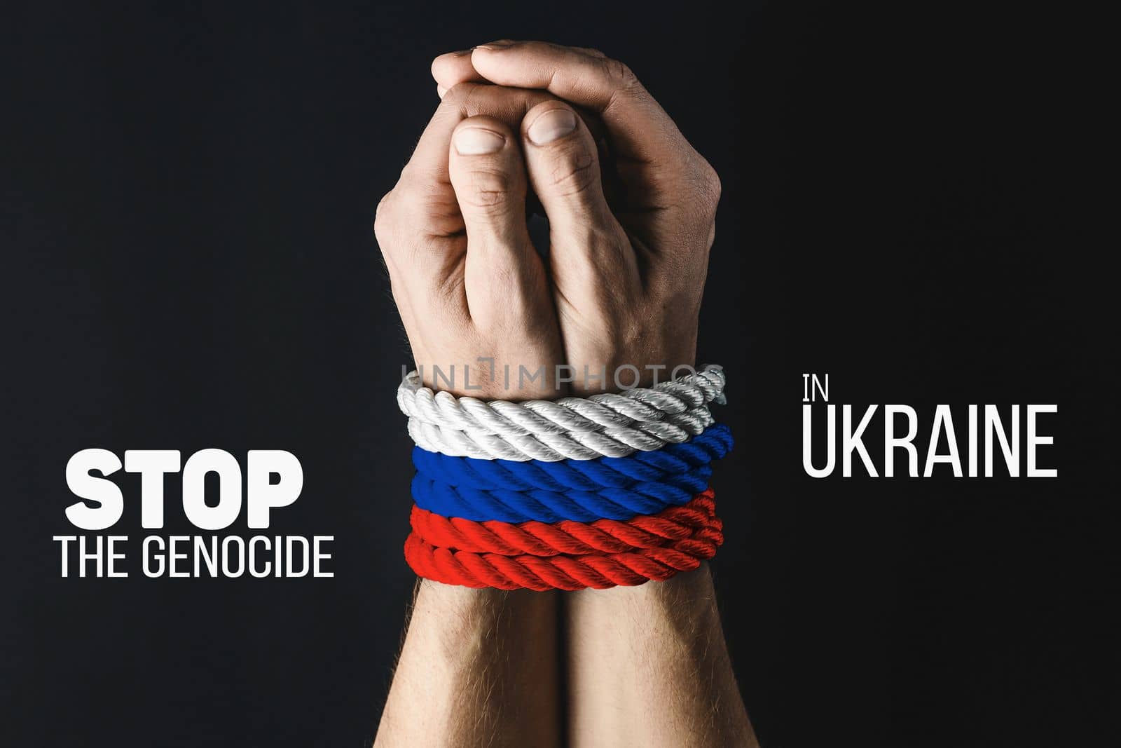 tightly tied hands with red blue white rope by alexxndr