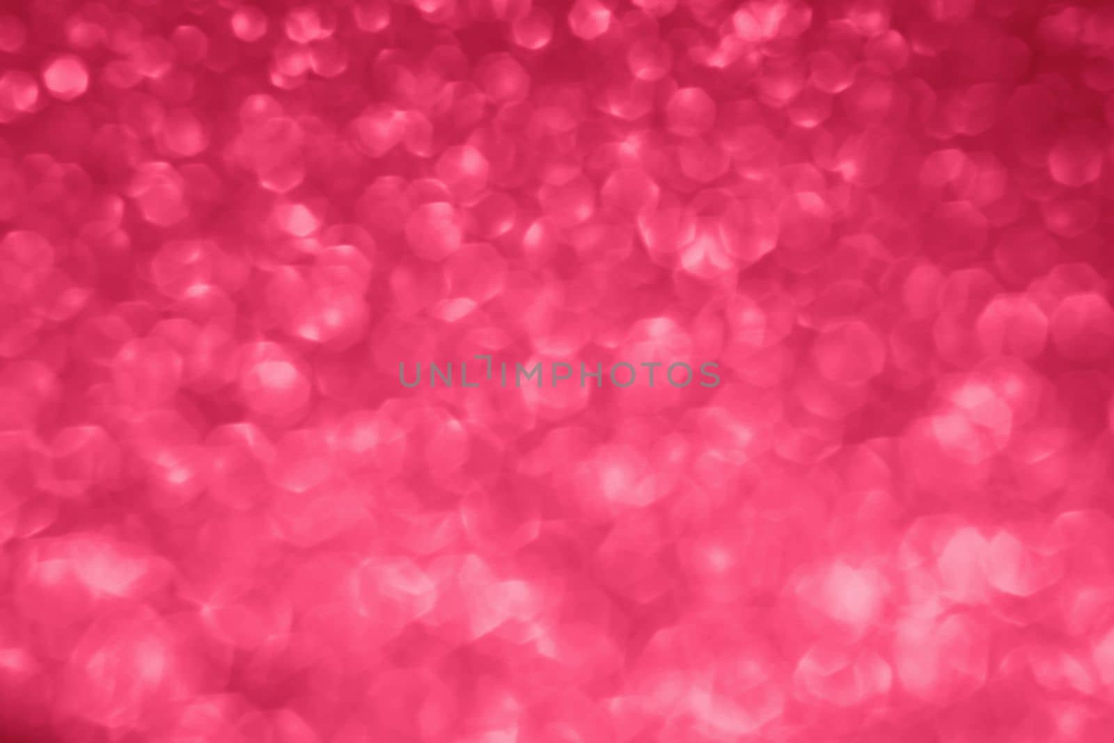 Viva Magenta lights bokeh background, Chrismas lights bokeh. Viva Magenta abstract background. Blurred and glowing lights. Viva Magenta bokeh lens effect from lighting spots. High quality photo