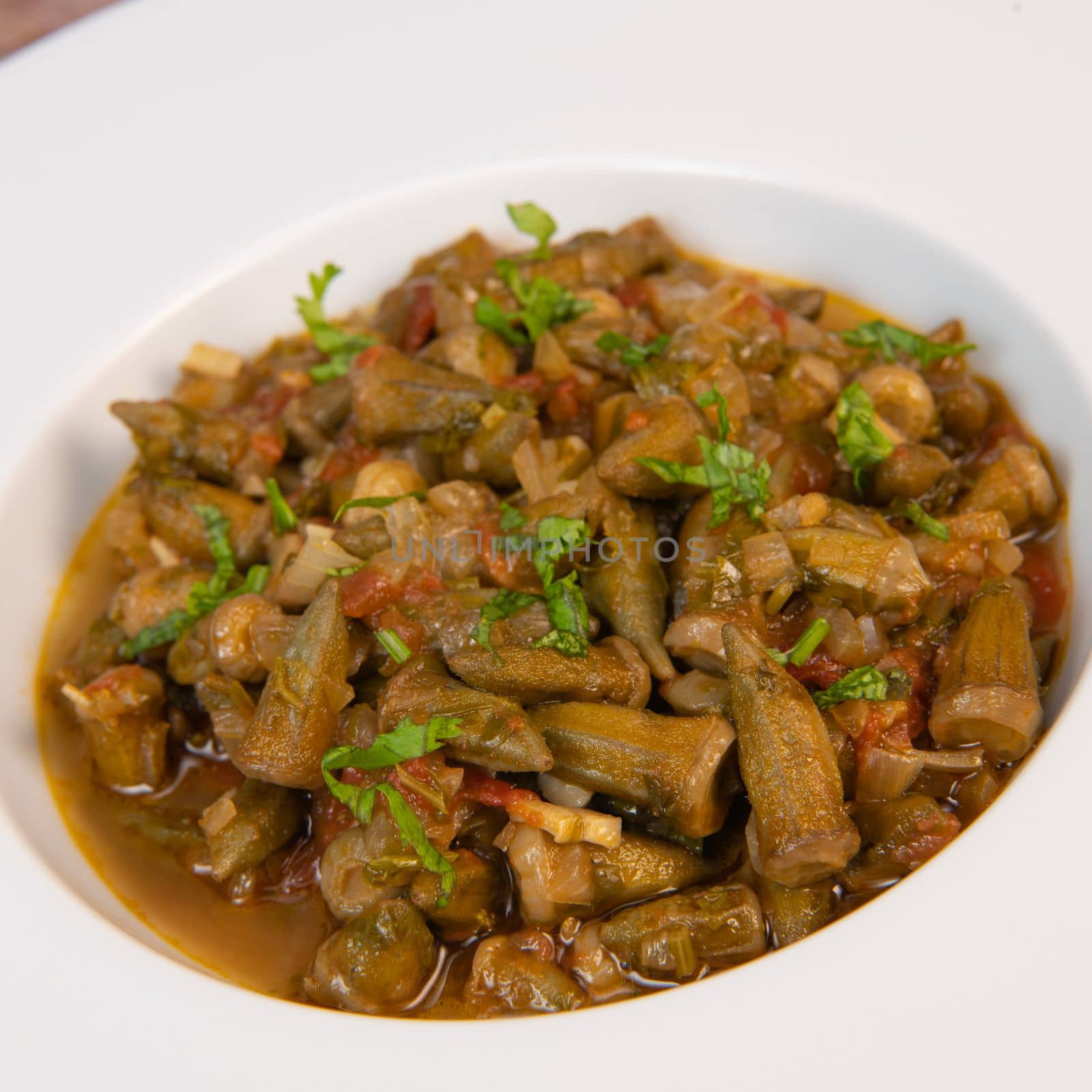 Bhindi masala or ladies finger fry served with indian roti chapati or Indian Flat bread. High quality photo