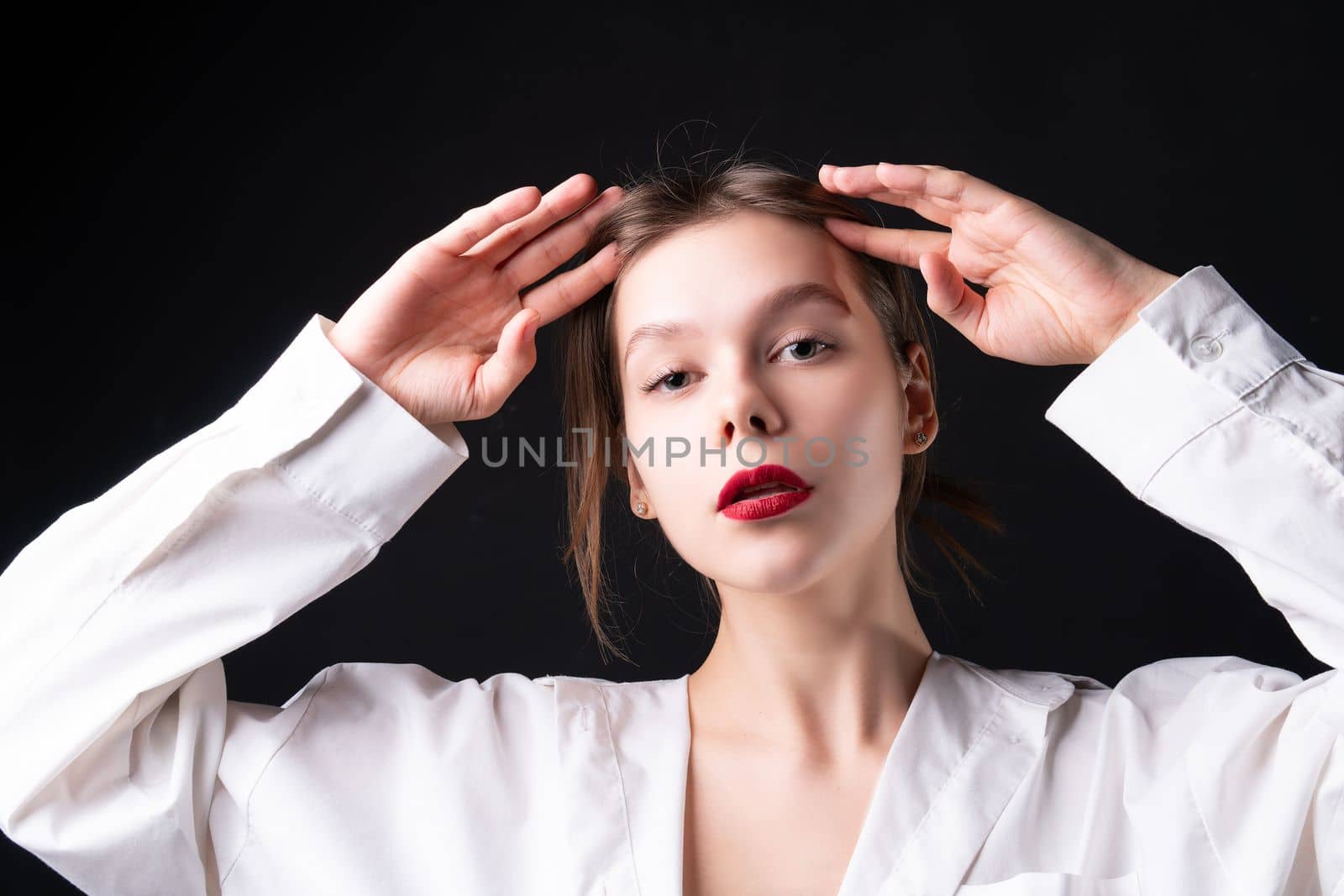 elegance attractive studio model hairstyle makeup Hands up posing female portrait beauty girl by 89167702191