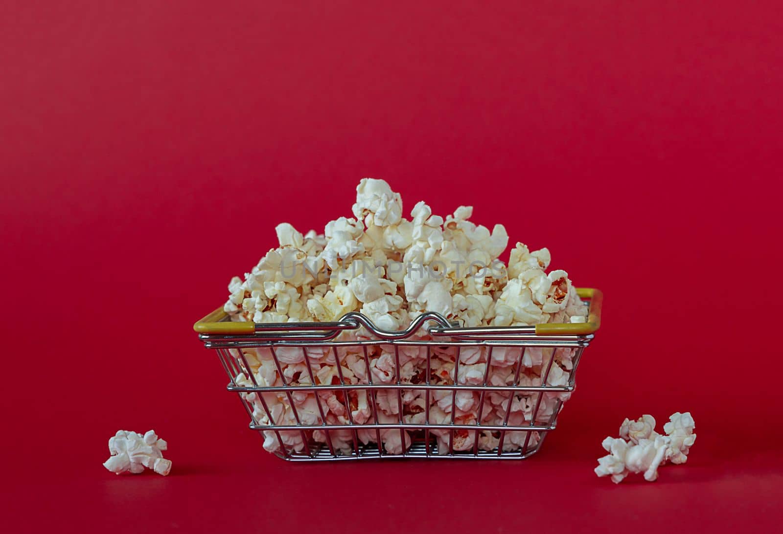 National popcorn day concept. Bowl full of popcorn. Leisure idea.