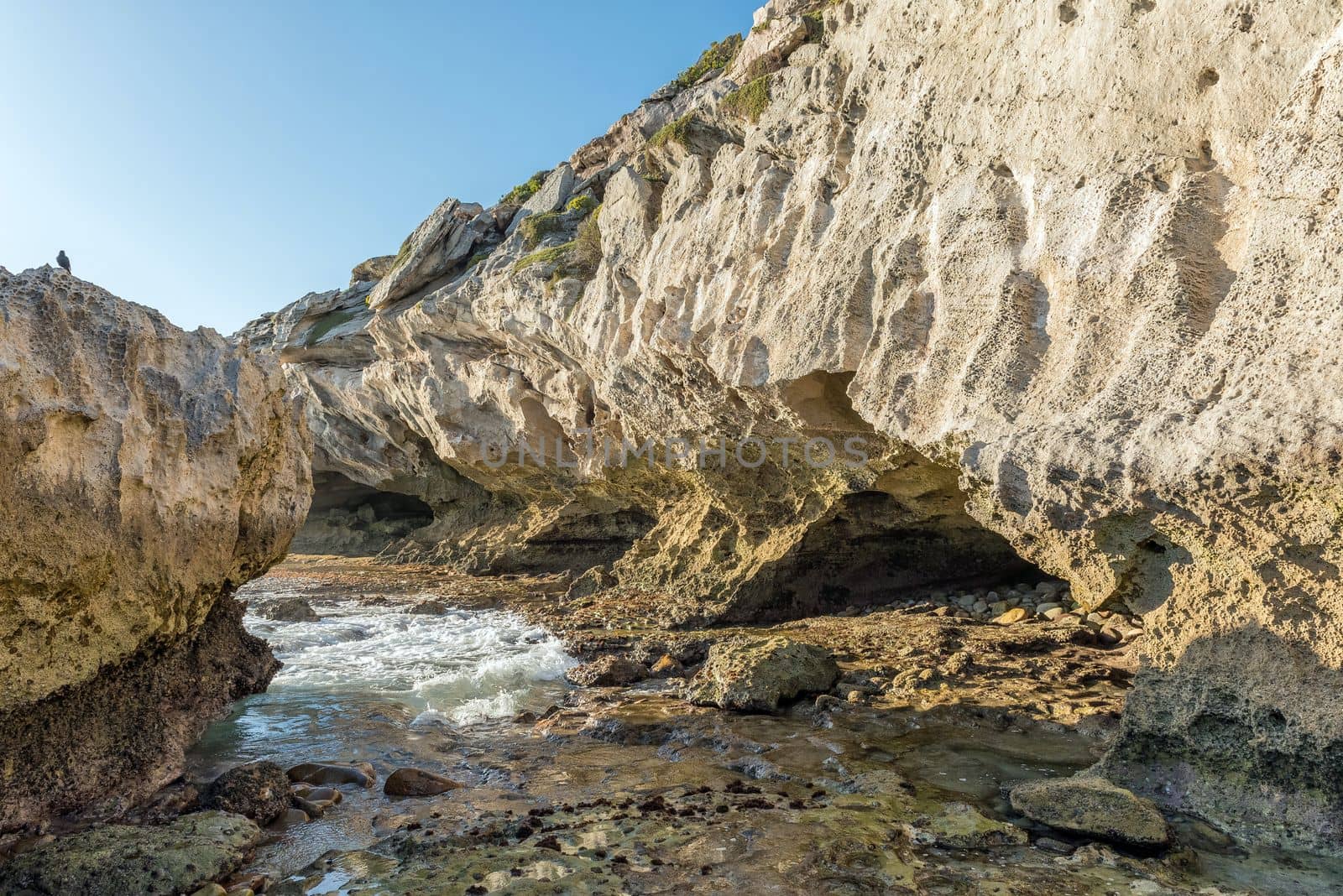 Trail to the back entrance of the Waenhuiskrans Cave near Arniston in the Western Cape Province, accessable only during low tide