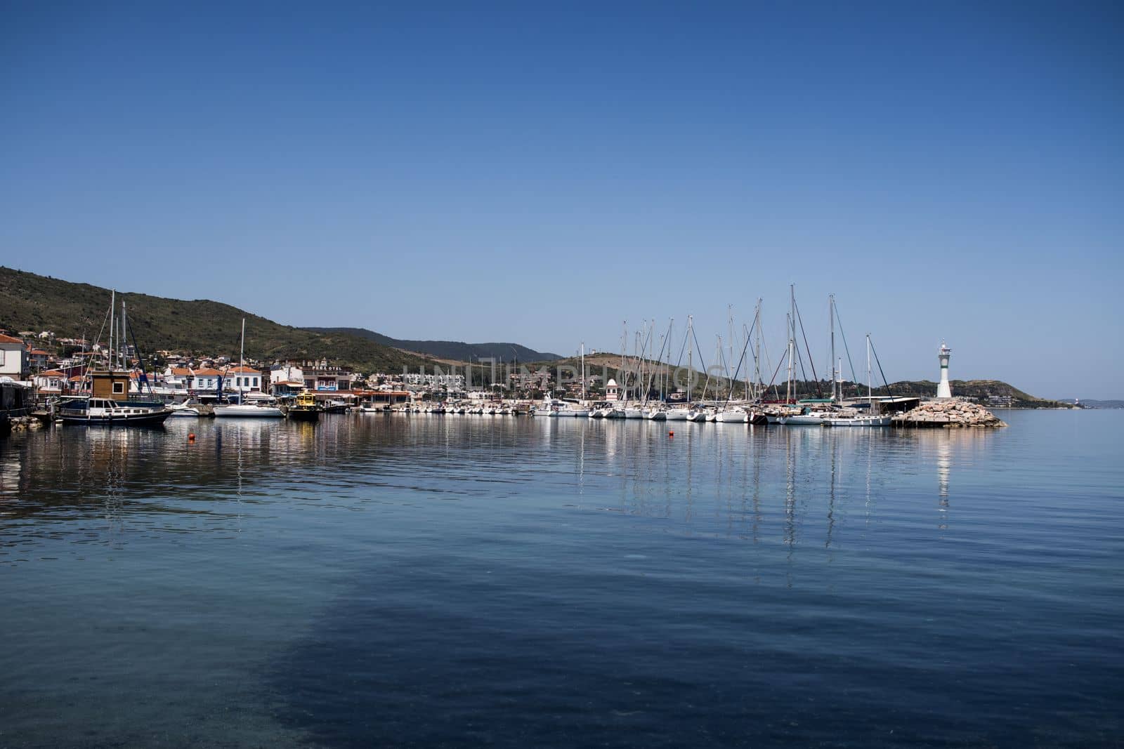 Urla, Turkey - may 12, 2020 : Harbour view in Iskele, Urla. Urla is populer fishing old town in Izmir. by senkaya